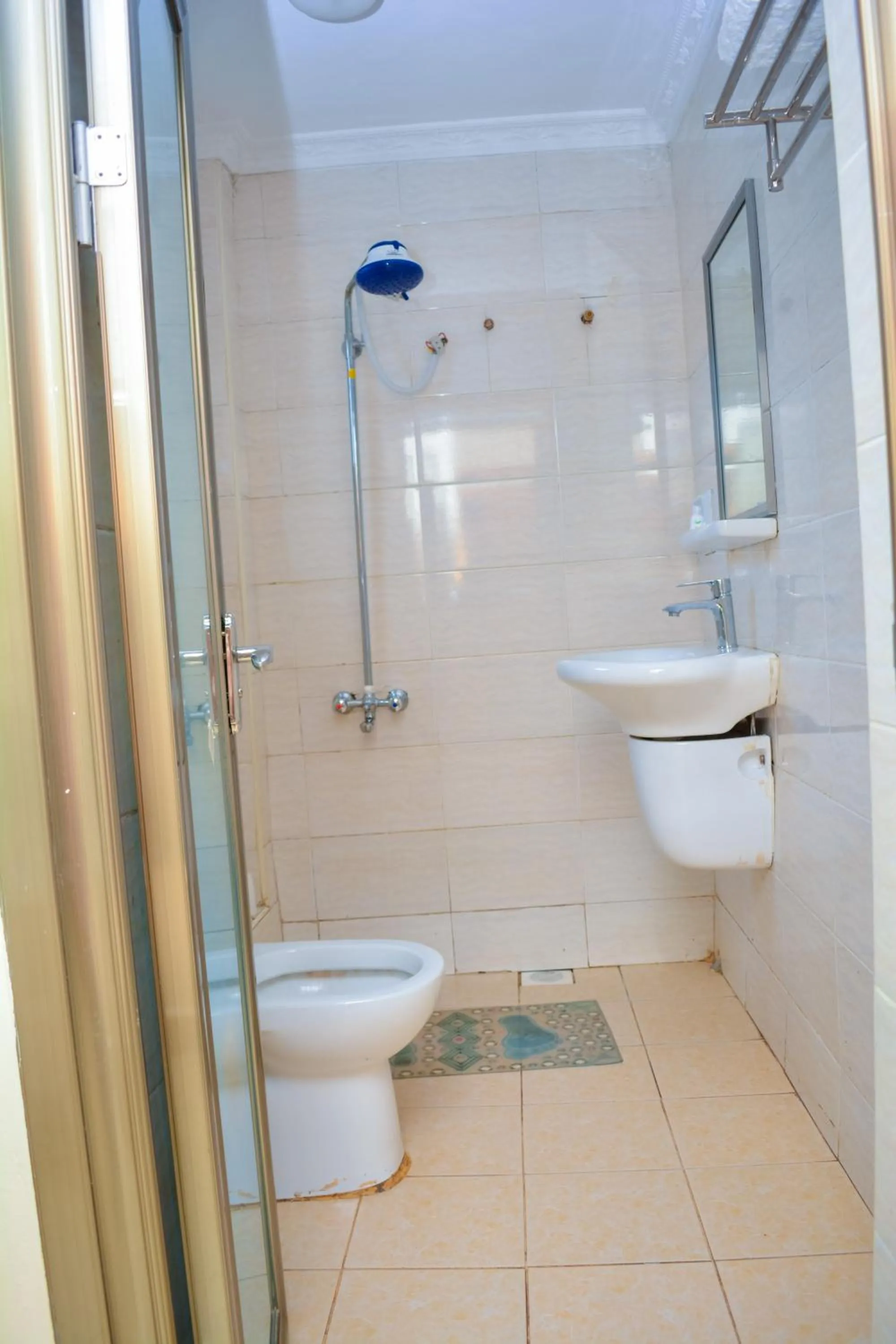 Bathroom in Omega Gardens Hotel