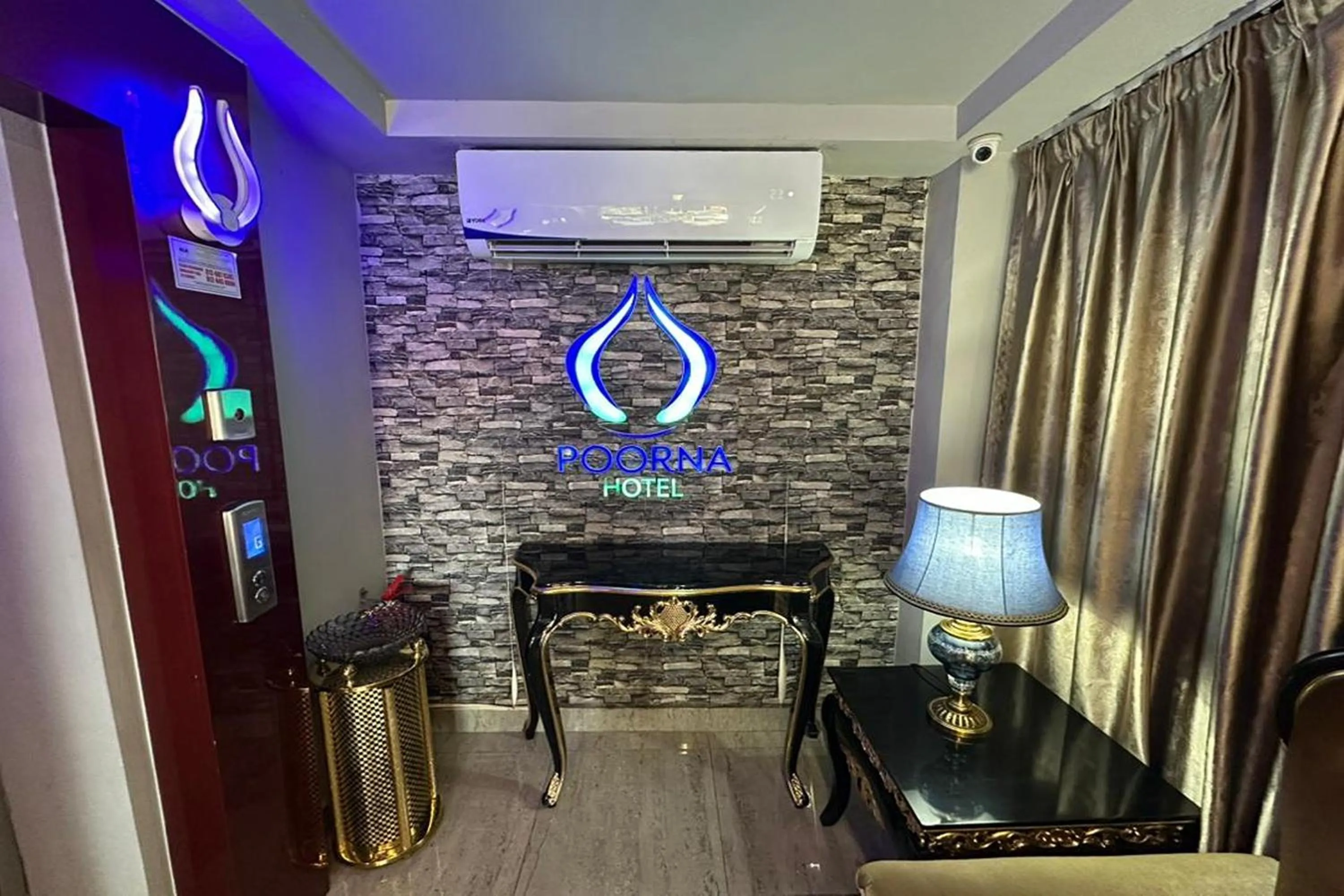 Lobby or reception in Poorna Hotel