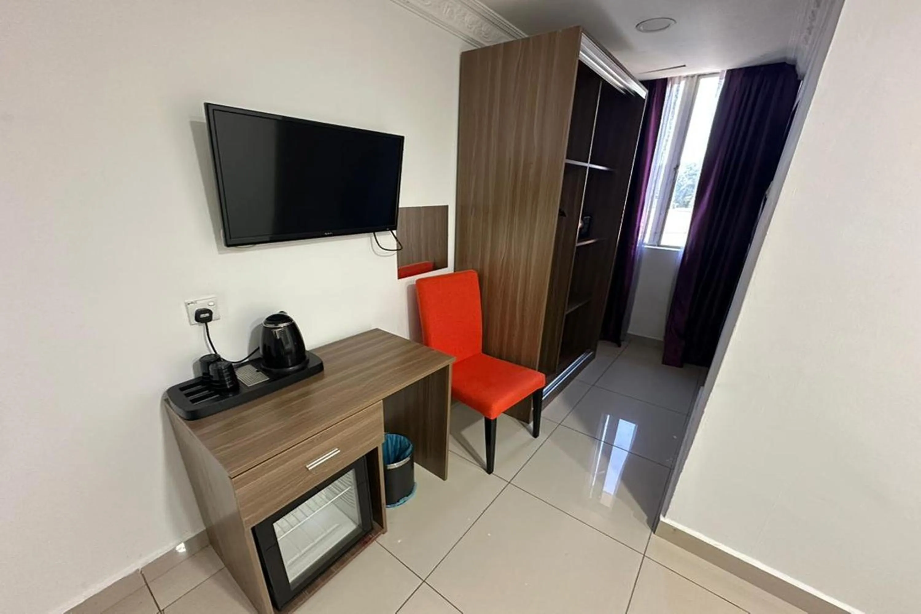 Bedroom in Poorna Hotel