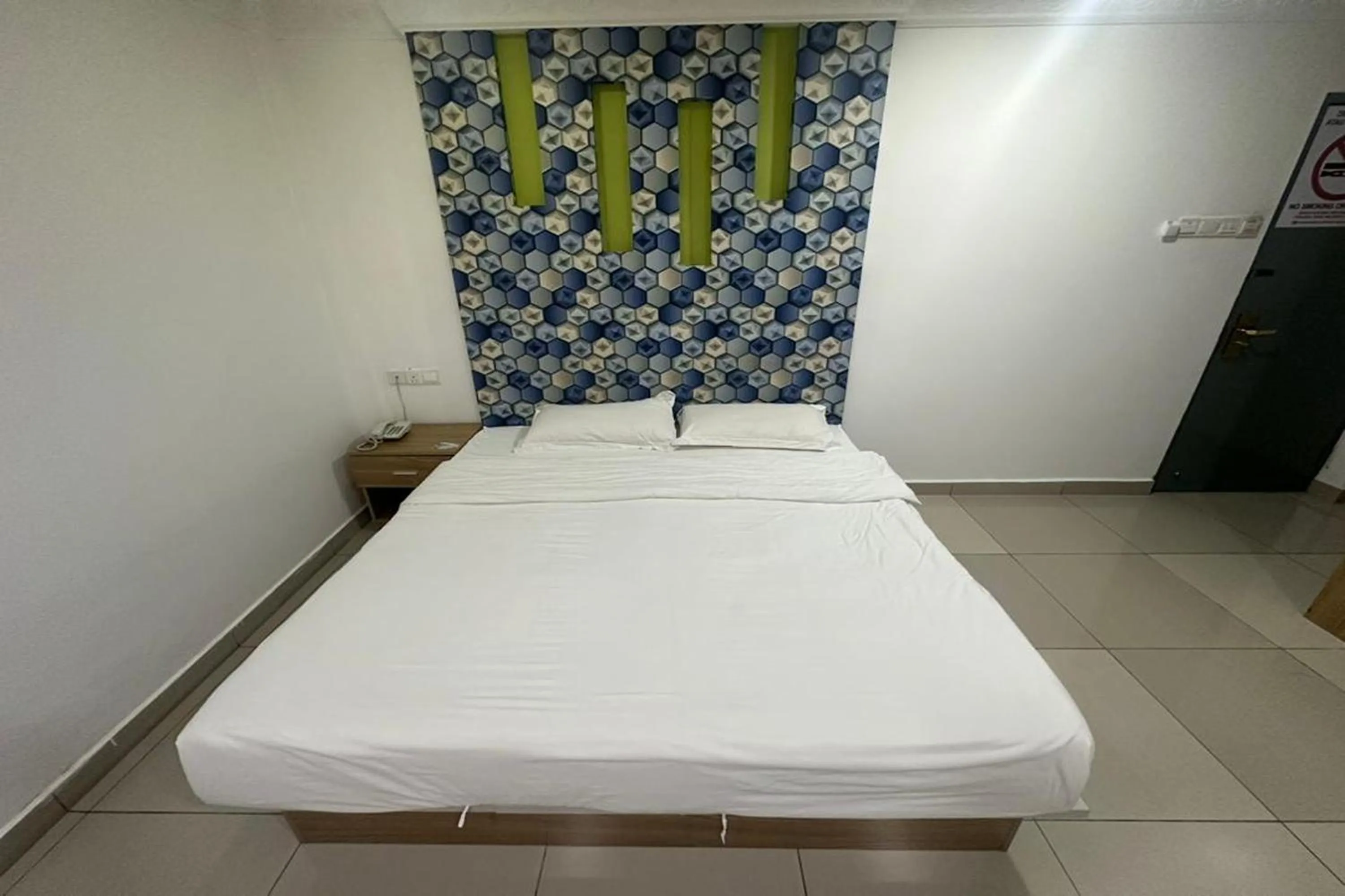 Bed in Poorna Hotel