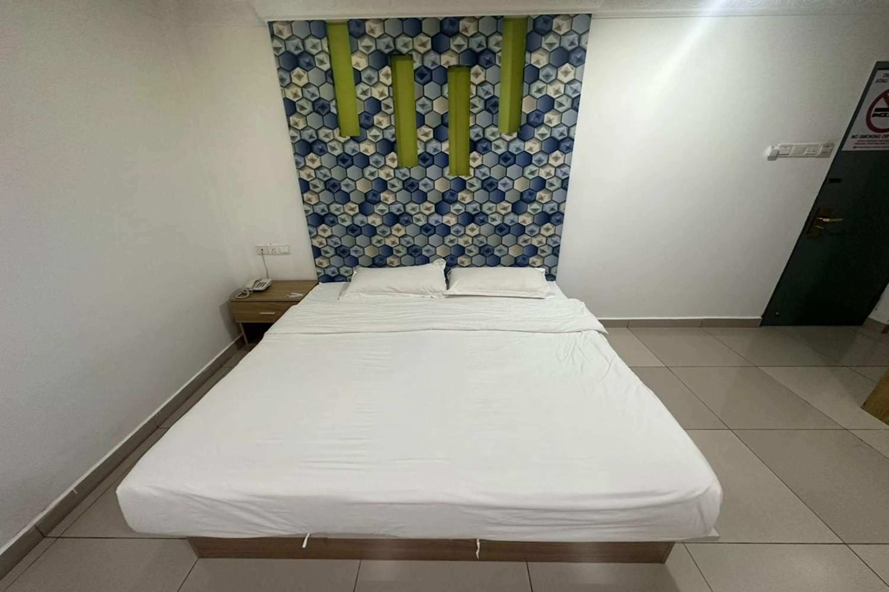 Bed in Poorna Hotel
