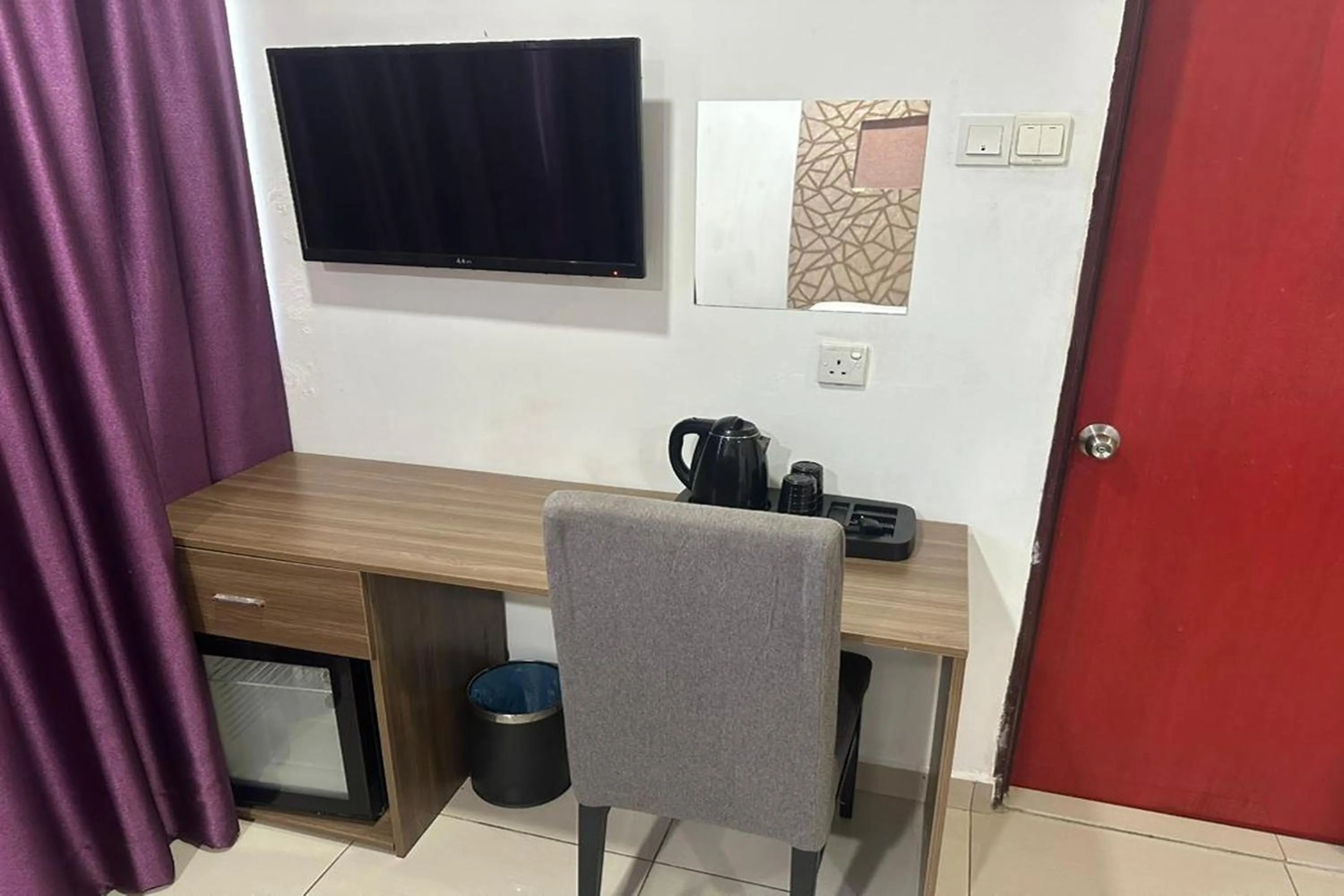 Bedroom in Poorna Hotel