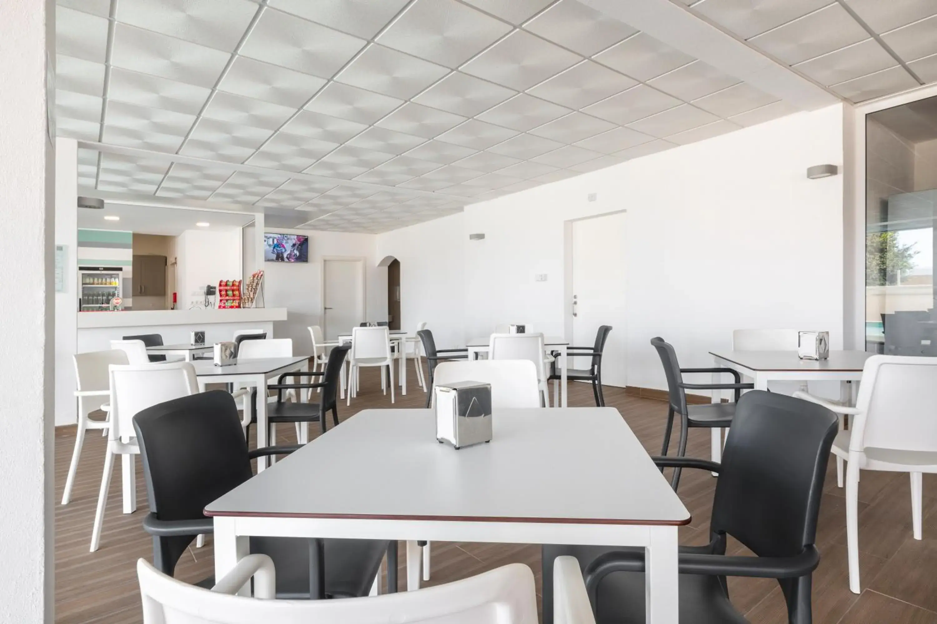 Lounge or bar in AlvorMar Apartamentos Turisticos Lounge or bar in AlvorMar Apartamentos Turisticos