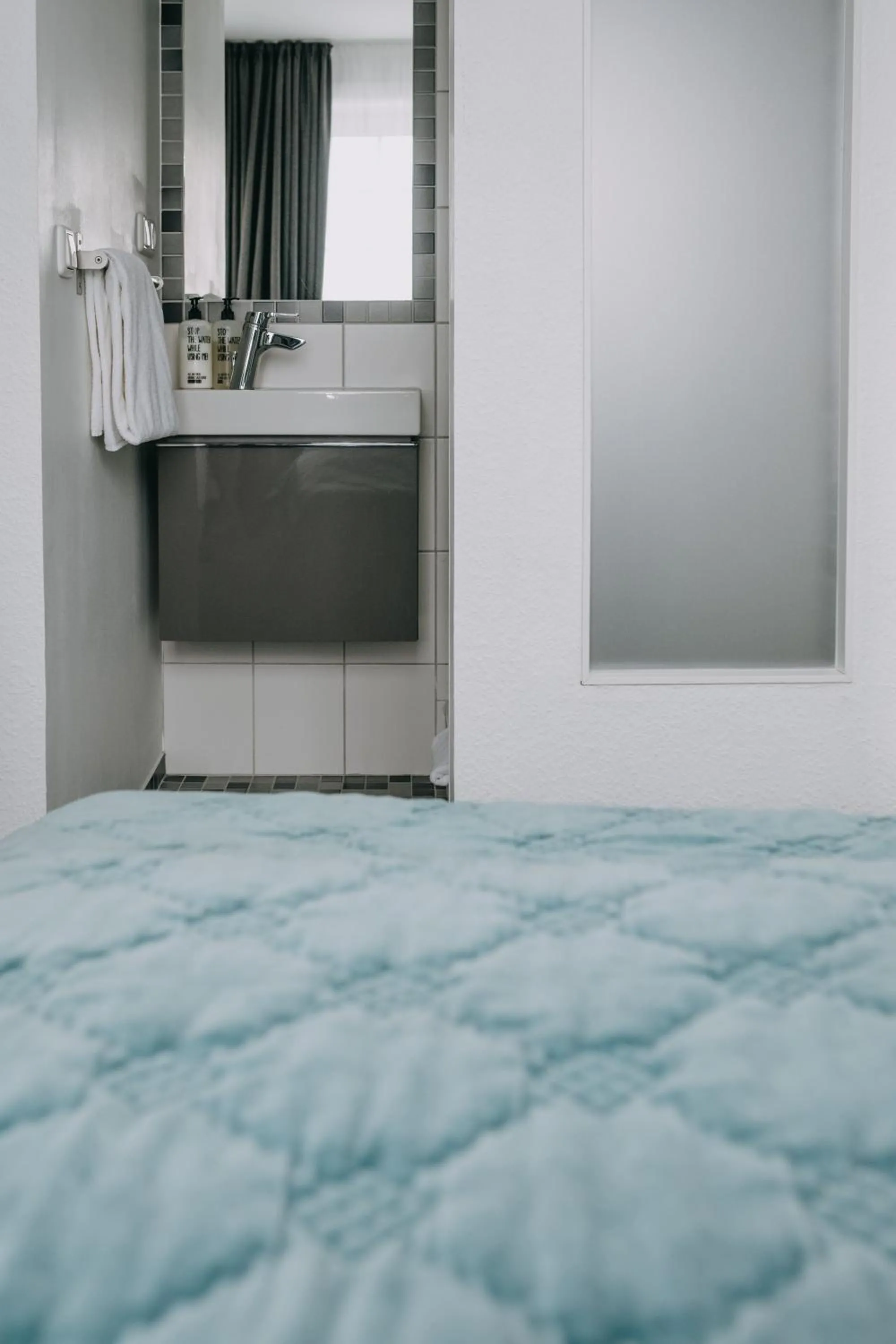 Bathroom, Bed in meerzeit Hotel