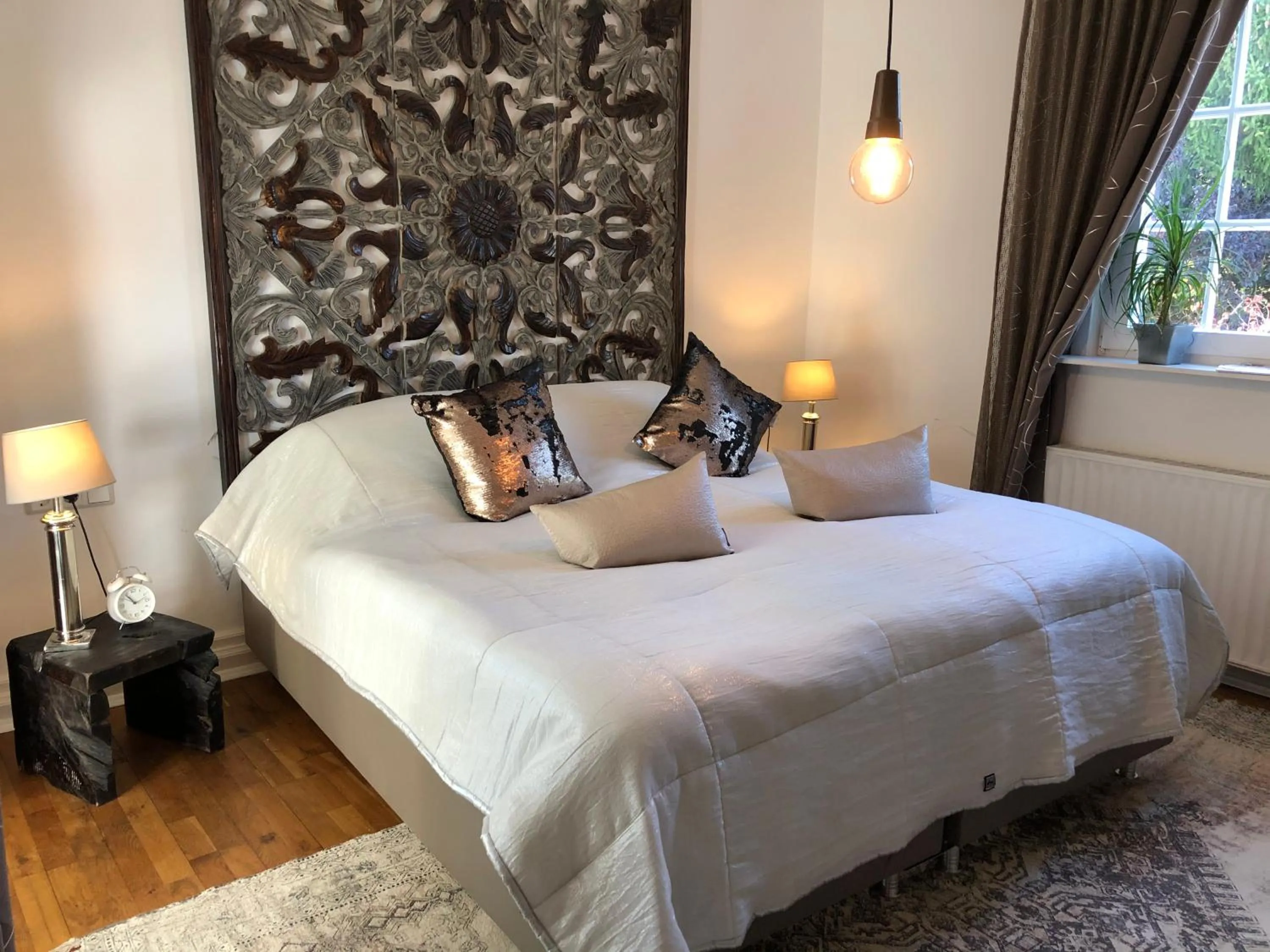 Bed in VILLA ADELEes BOUTIQUE HOTEL