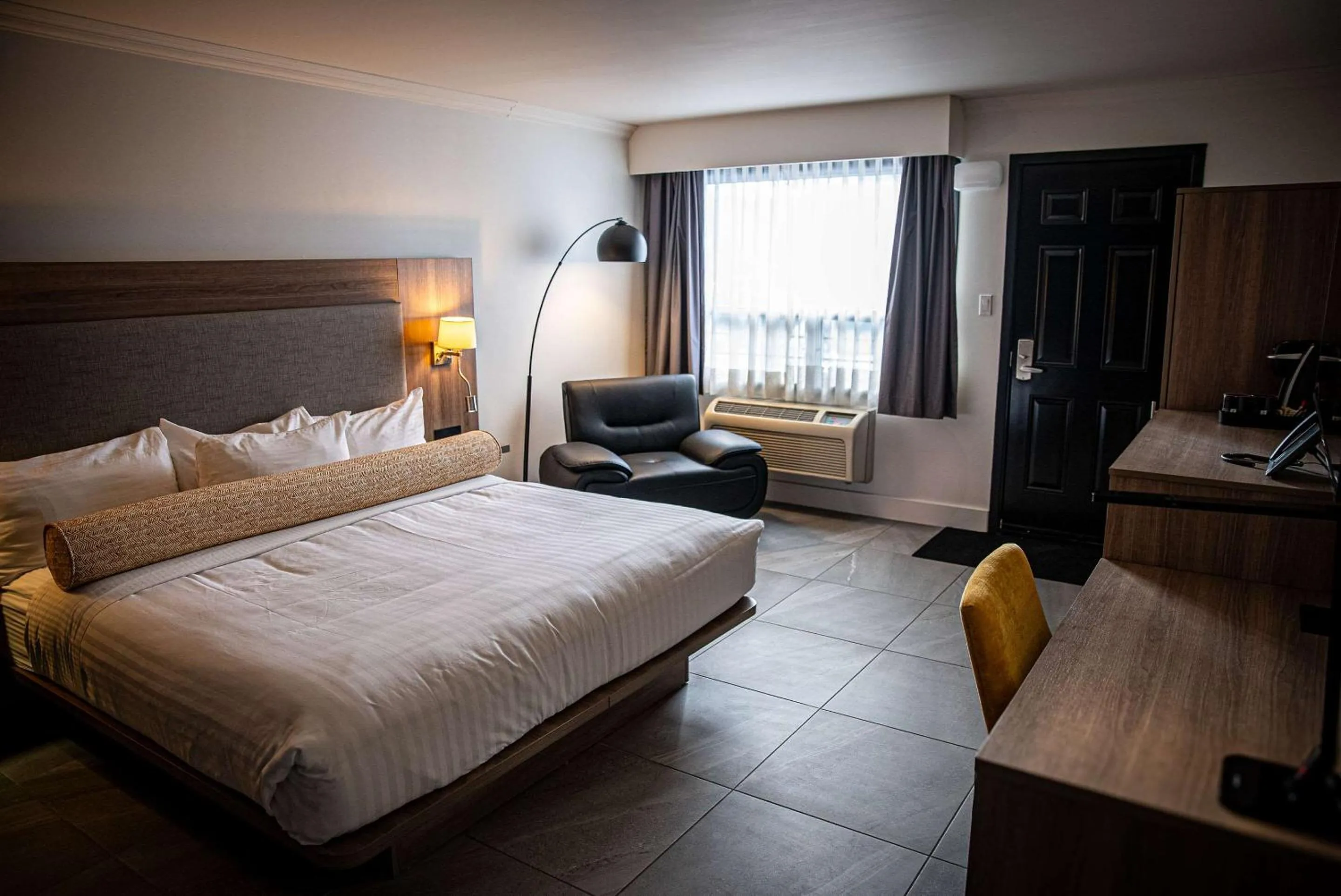 Bedroom, Bed in Le Noranda Hotel & Spa, an Ascend Collection Hotel