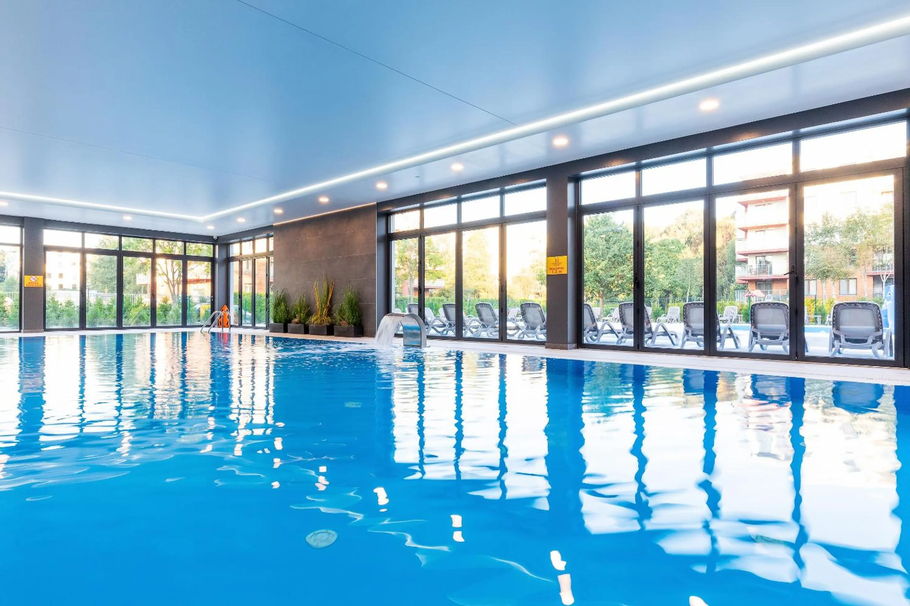 Property building in Apartamenty Polanki Park BASEN, SAUNA & SIŁOWNIA by Noclegi Renters