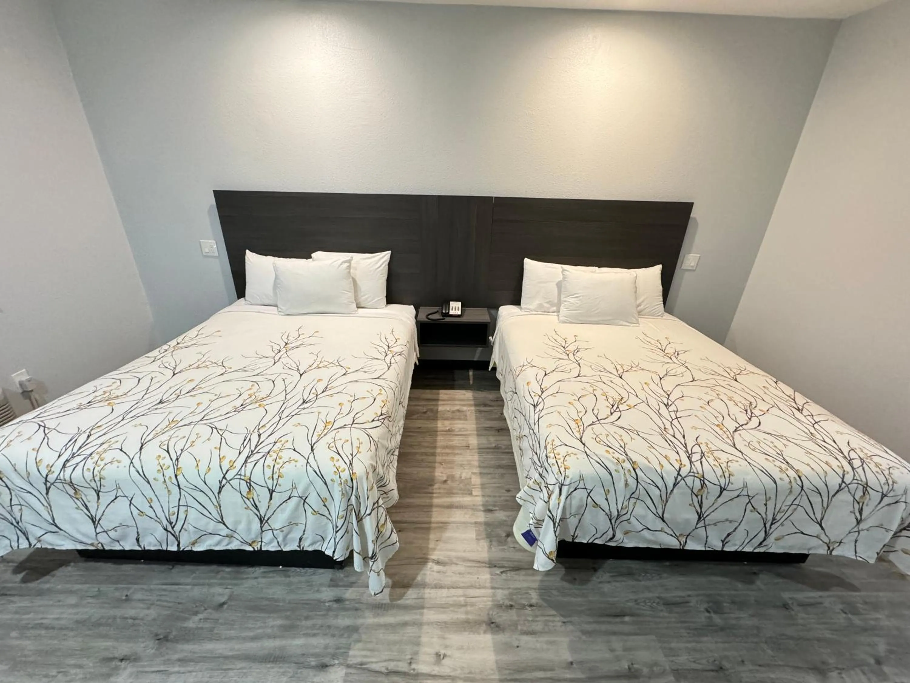 Bed in Americas Best Value Inn & Suites Haltom City Ft. Worth