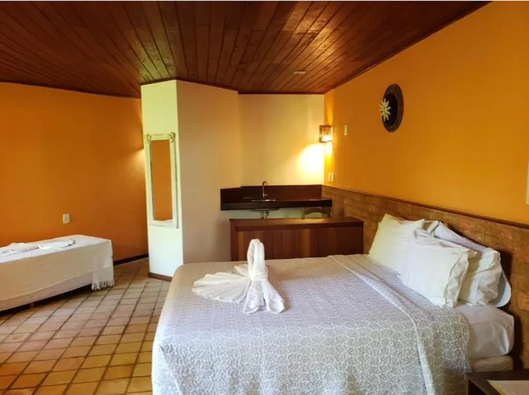 Bed in Pousada Bichelenga