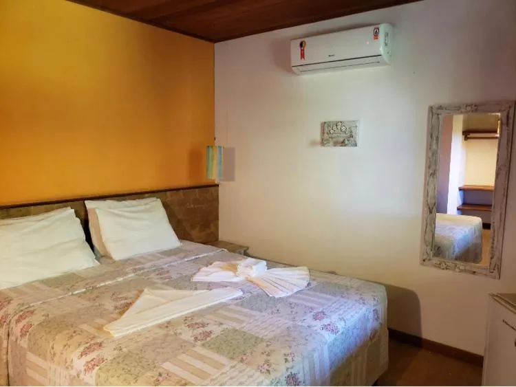 Bed in Pousada Bichelenga