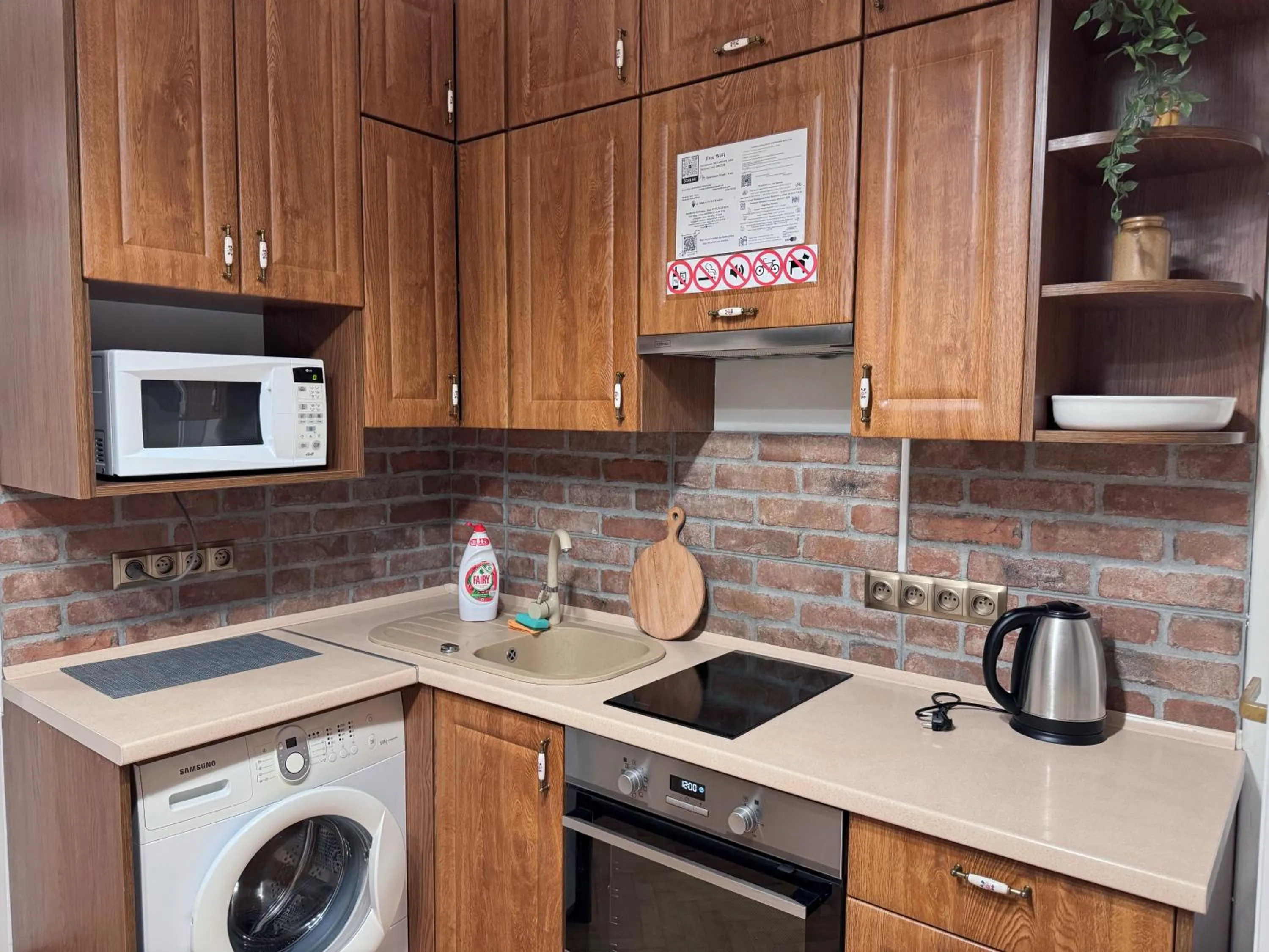 Kitchen or kitchenette in Lorf Hostel&Apartments