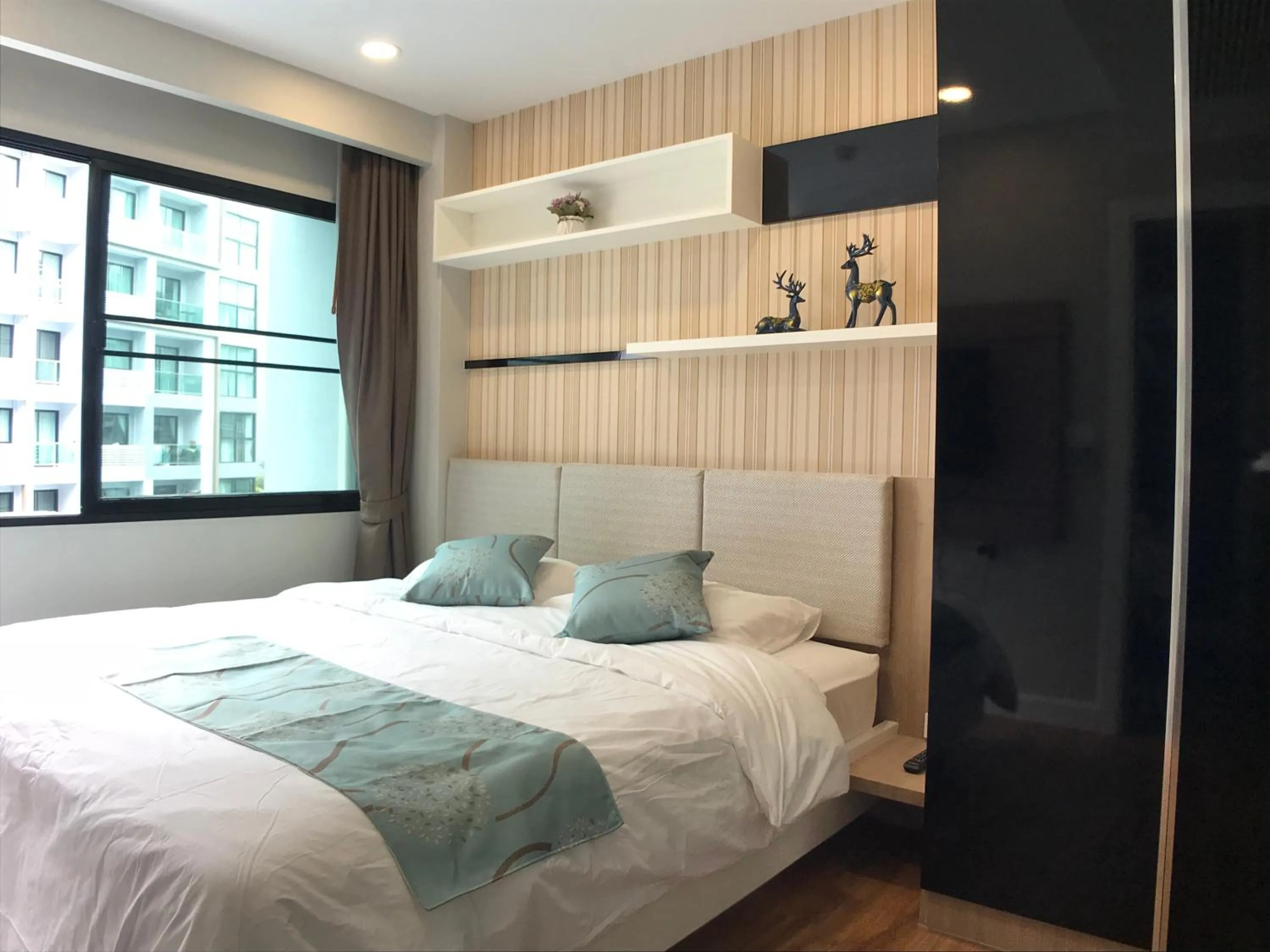 Bed in Dusit Grand Park Pool View Room