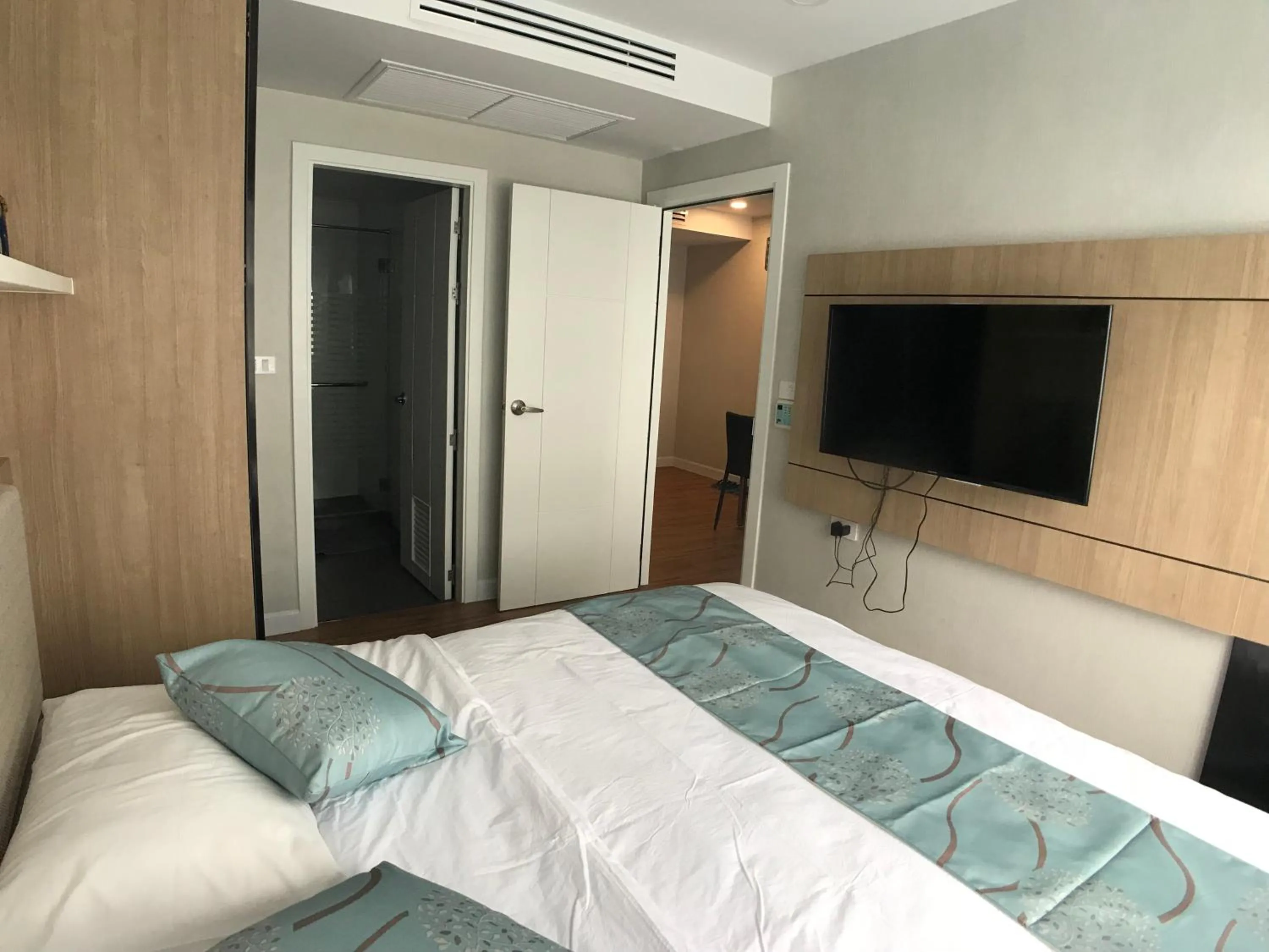 Bed in Dusit Grand Park Pool View Room