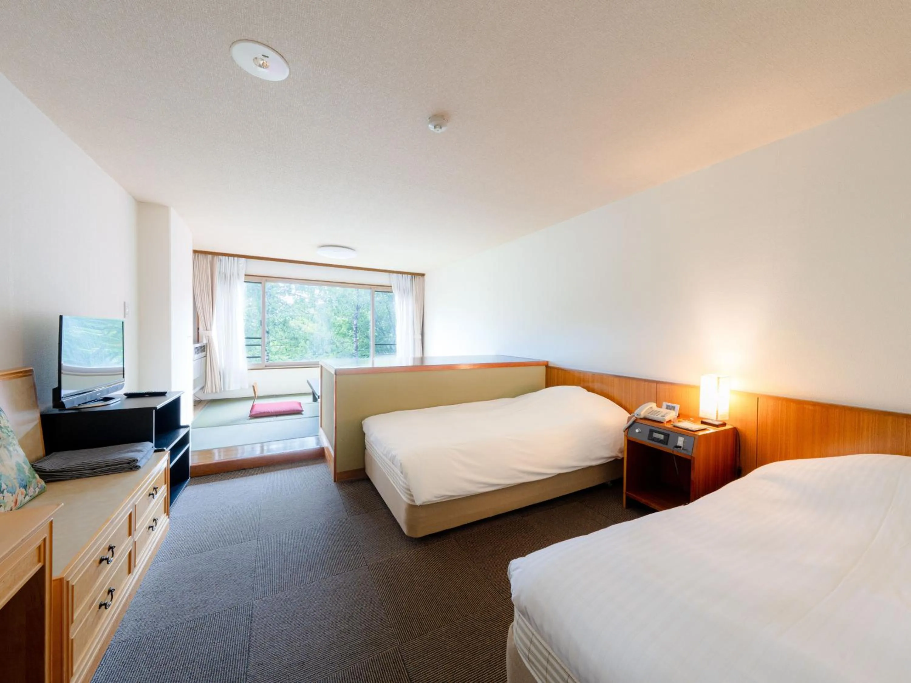 Bed in Okunikko Konishi Hotel