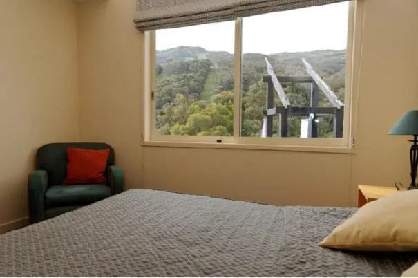 Bed in Squatters Run Apartments