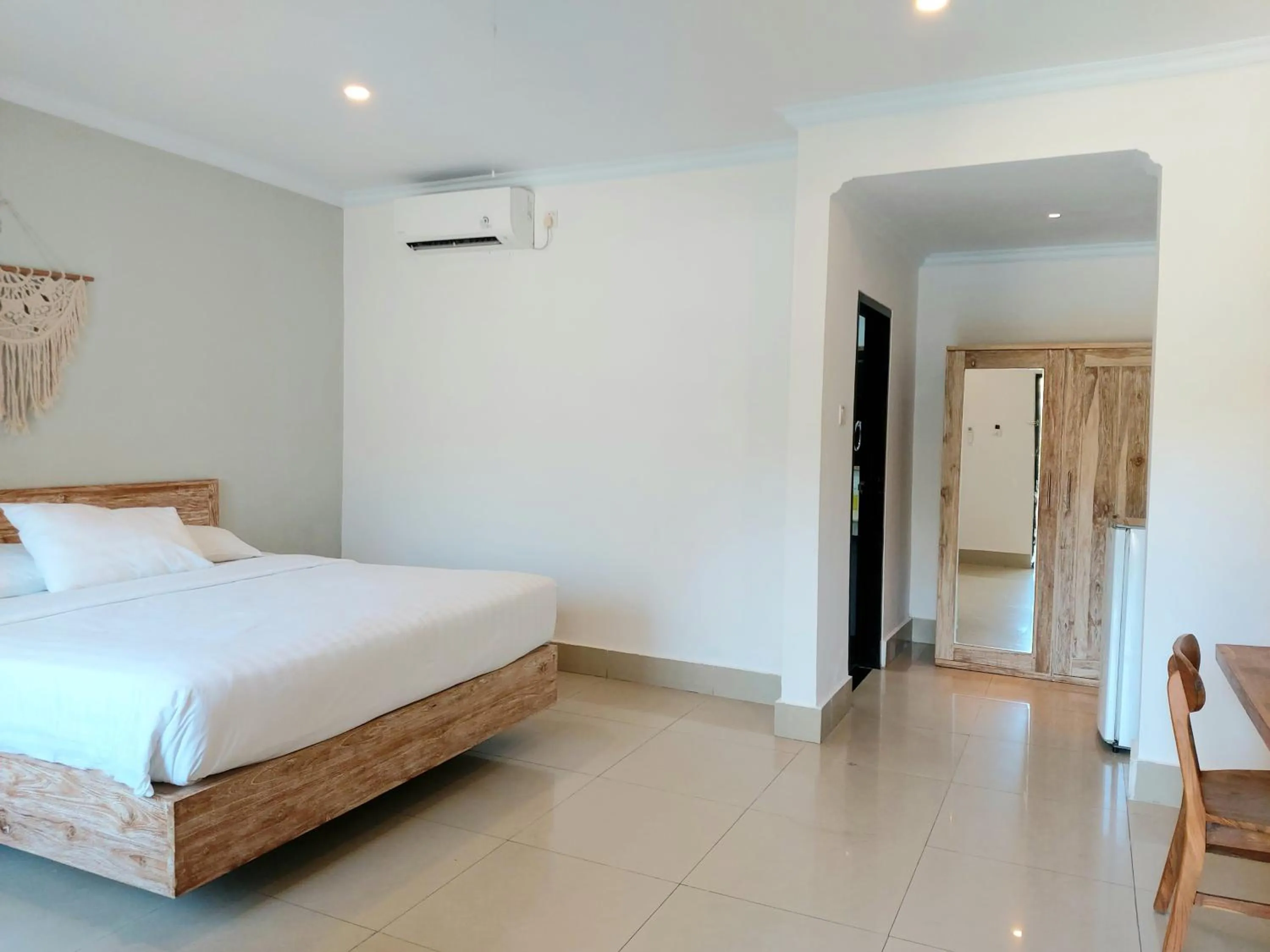 Bed in Radha Bali Hotel