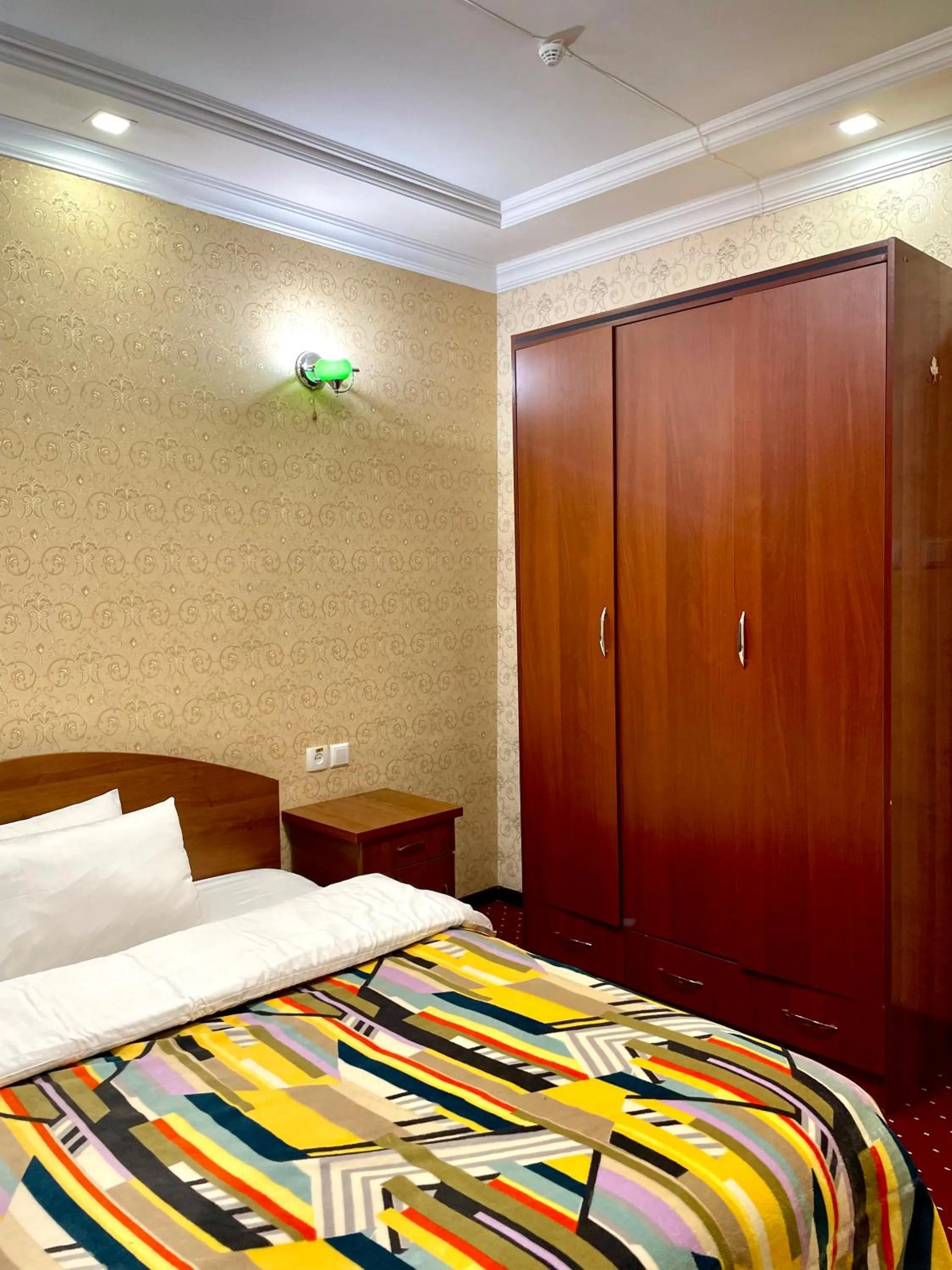 Bed in Asson Hotel Termez