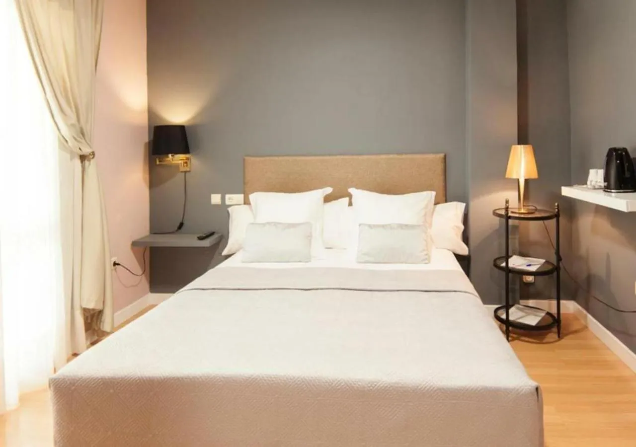 Photo of the whole room, Bed in Hotel Boutique Villa Lorena by Charming Stay Adults Recommended