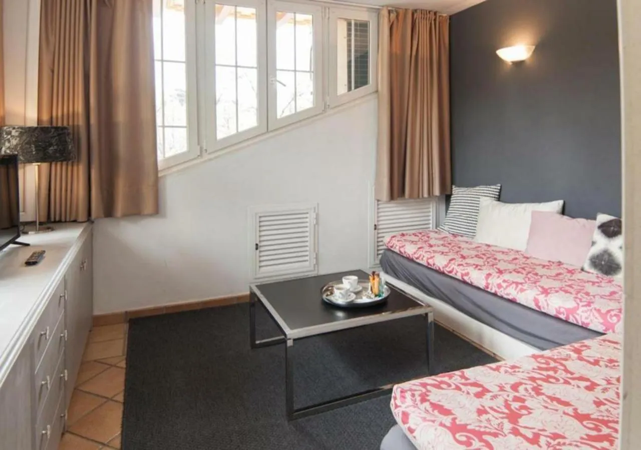 Communal lounge/ TV room in Hotel Boutique Villa Lorena by Charming Stay Adults Recommended