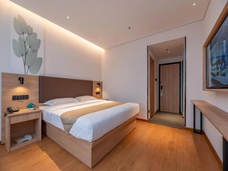 Bed in GreenTree Inn Ji‘nan Shanda Road Business Hotel