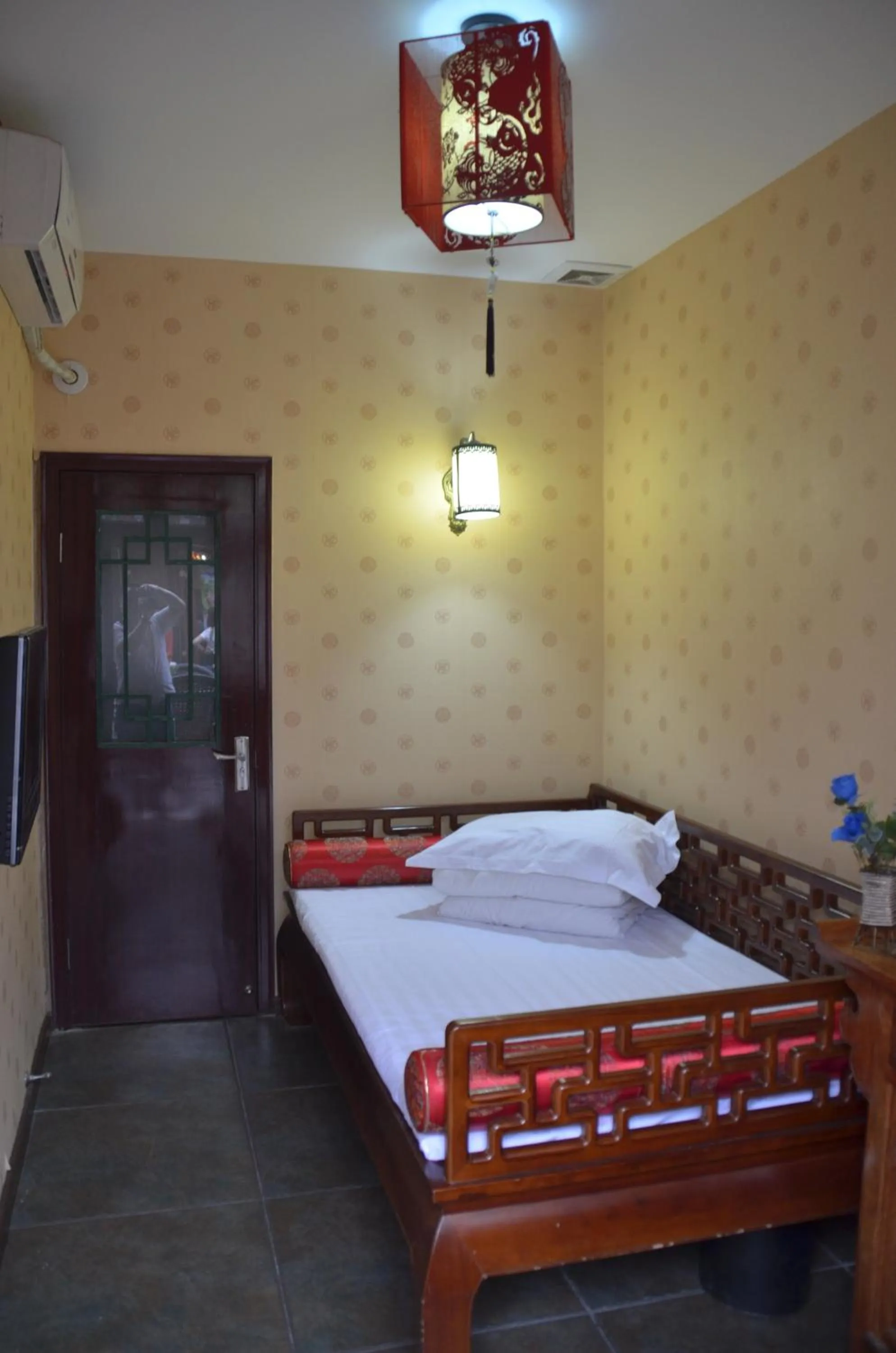 Bed in Qianmen Courtyard Hotel