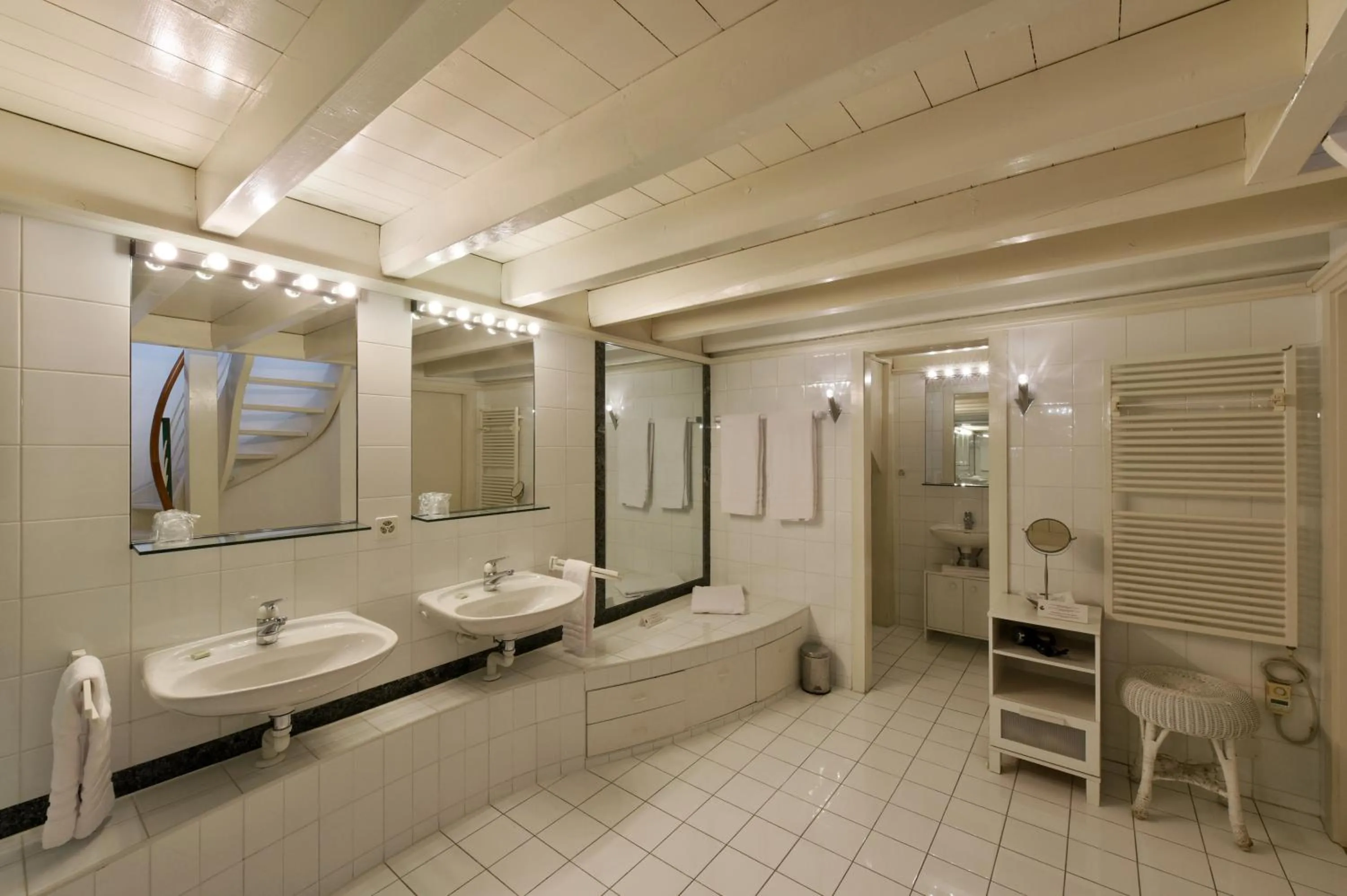 Bathroom in L'Hôtel by Hostellerie du Château