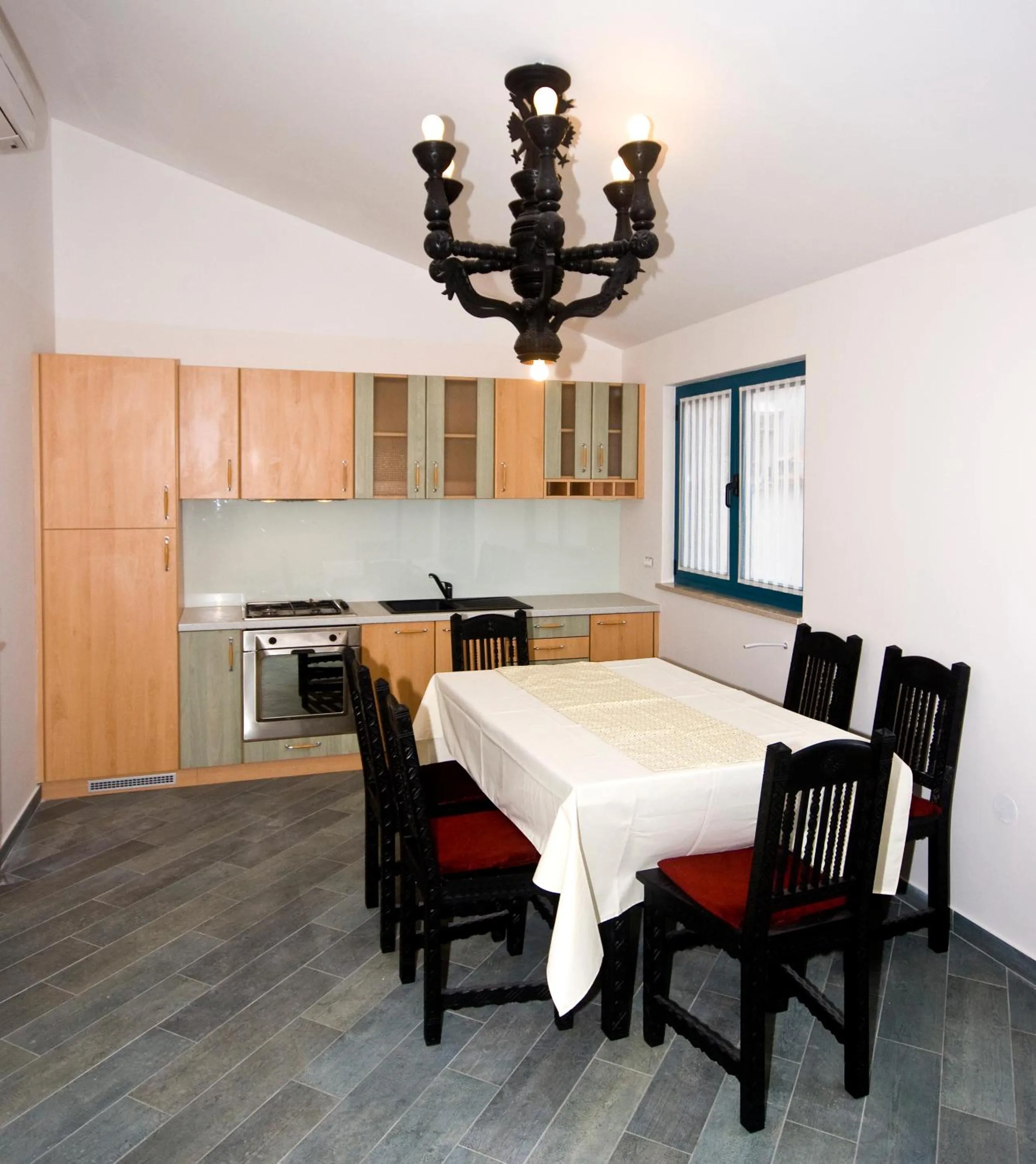 Kitchen or kitchenette in Rooms and Apartments Villa Dama