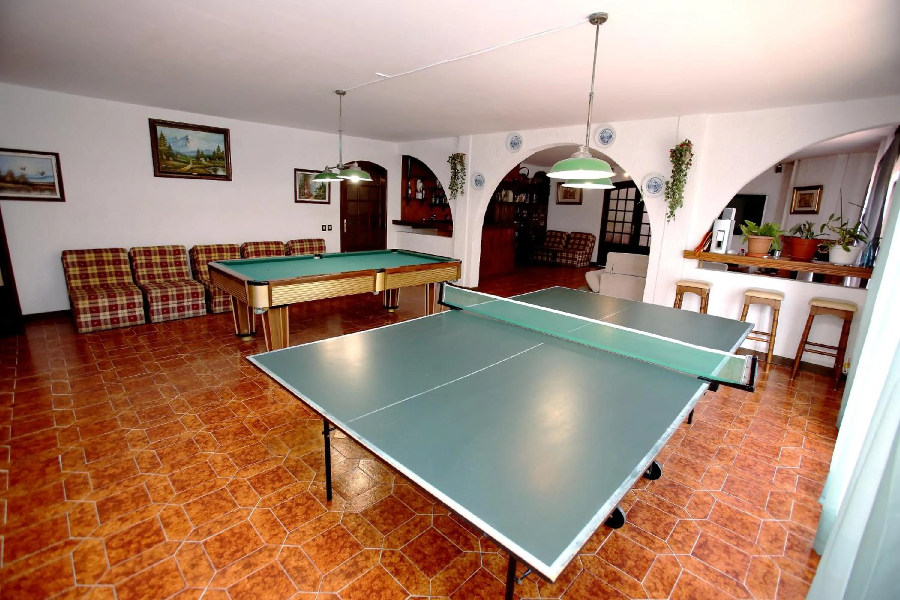 Communal lounge/ TV room in Belo Horizonte