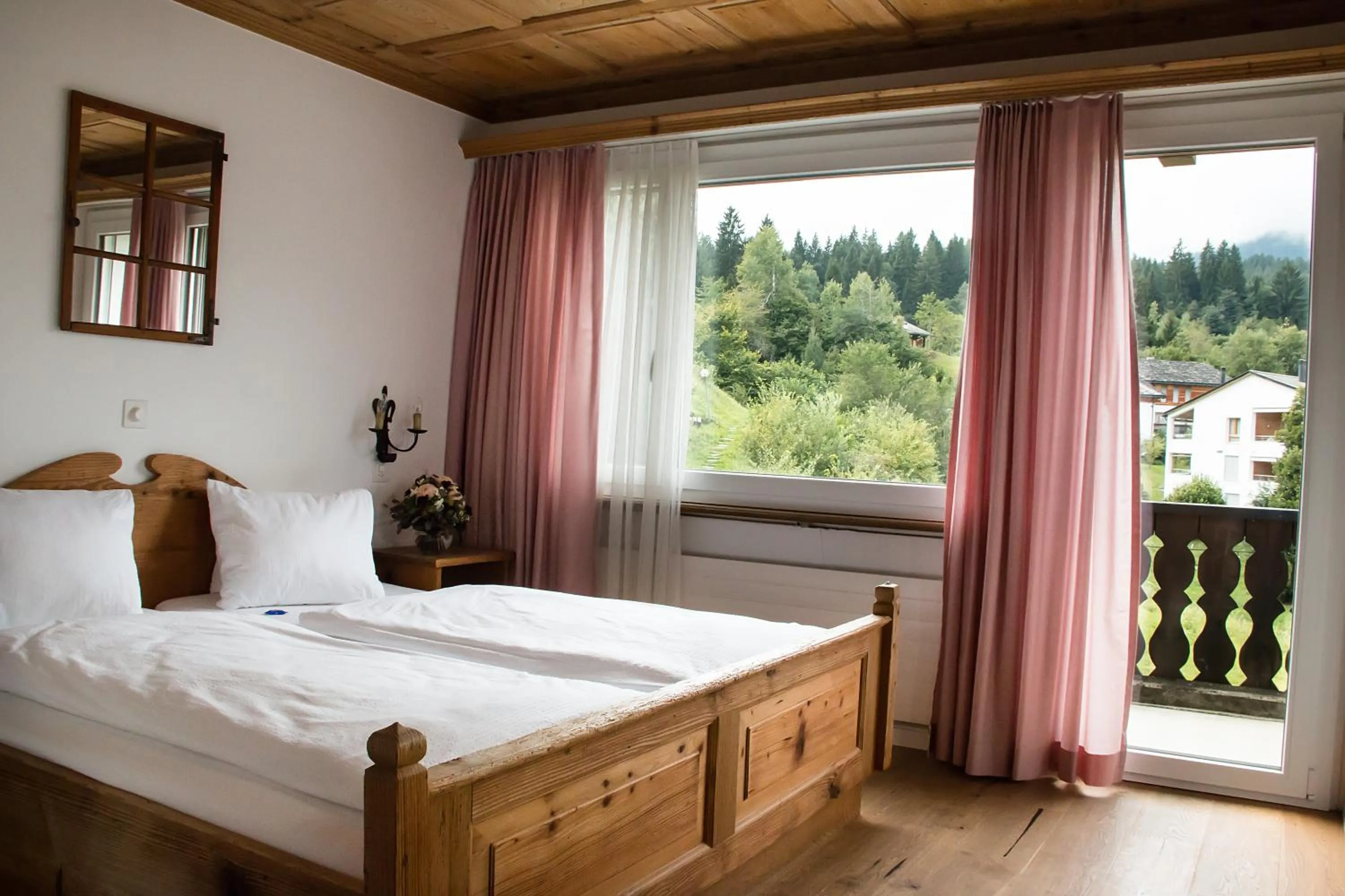 Bedroom, Bed in Hotel Restaurant Chesa