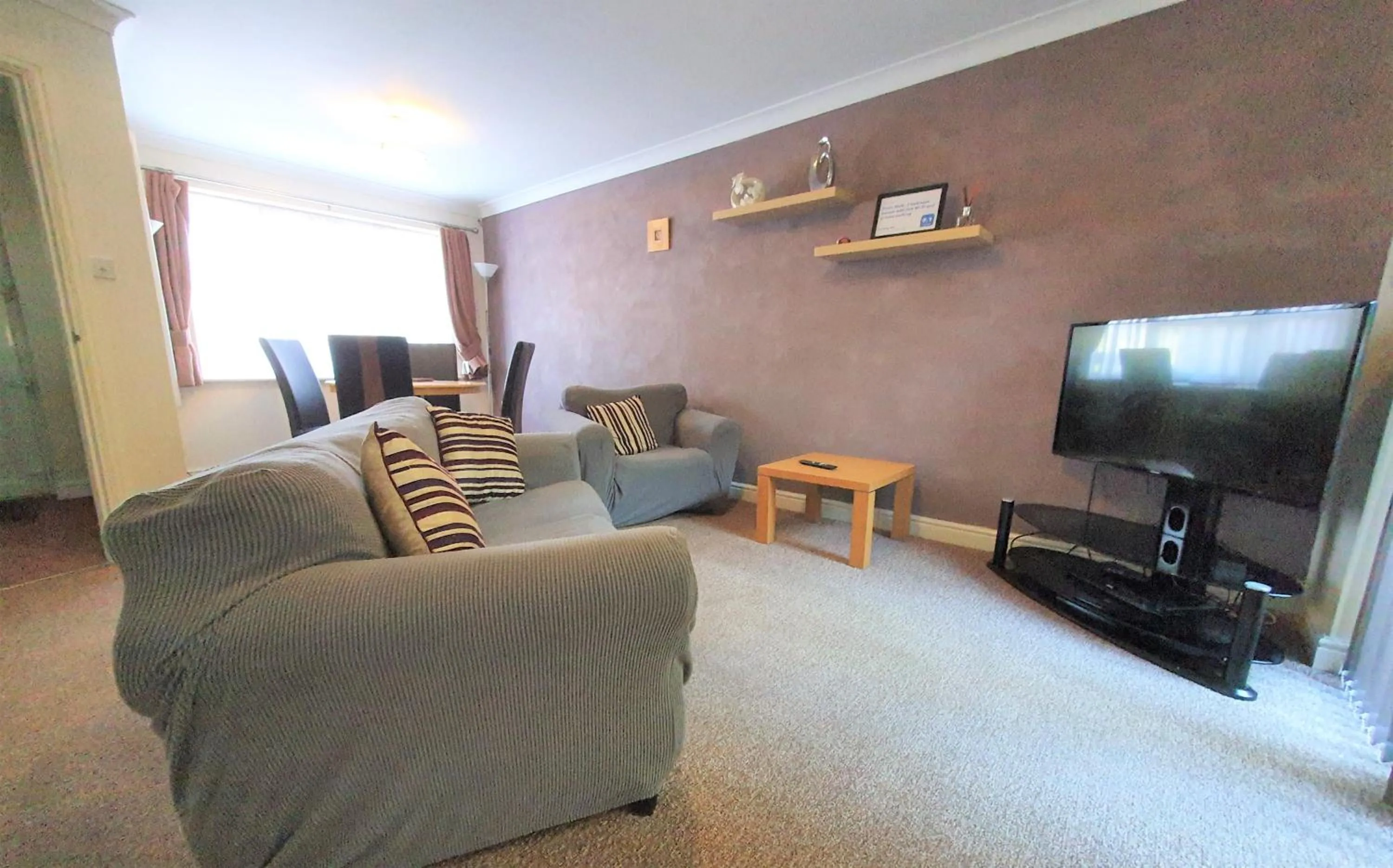 Living room in Friars Walk houses with 2 bedrooms, 2 bathrooms, fast Wi-Fi and private parking