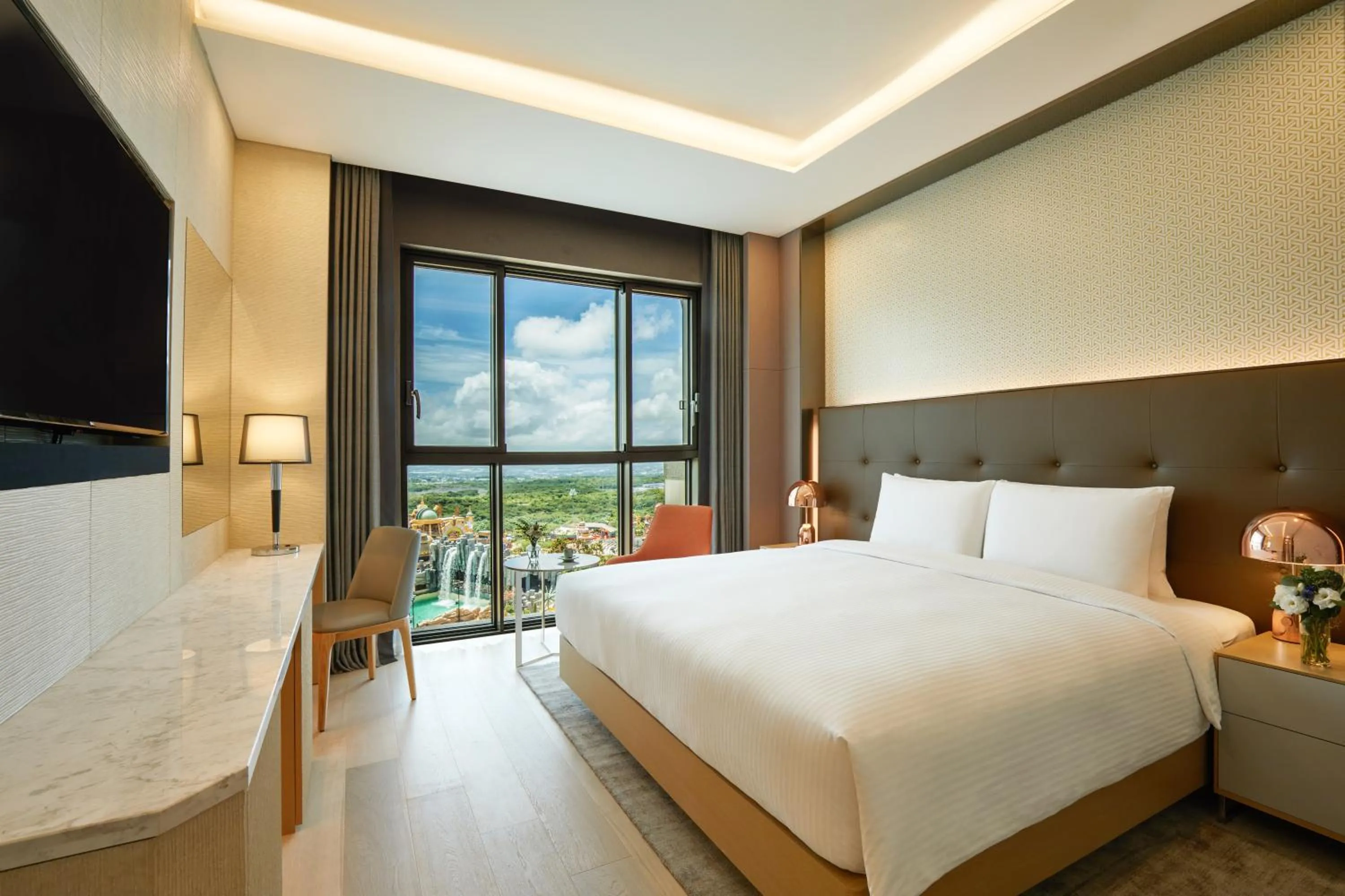 Bed in Shinhwa Jeju Shinhwa World Hotels