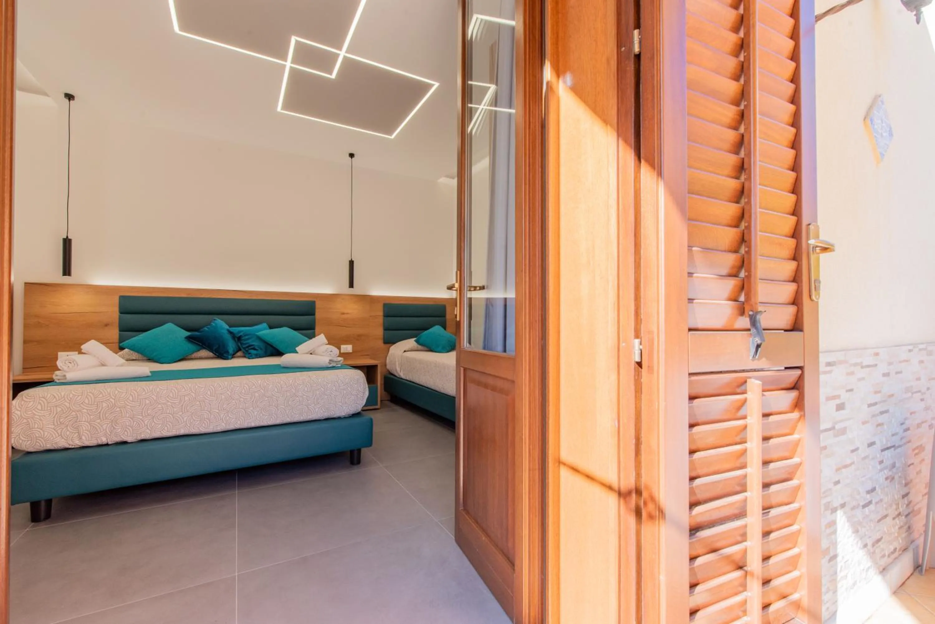 Bed in Affittacamere Aloe