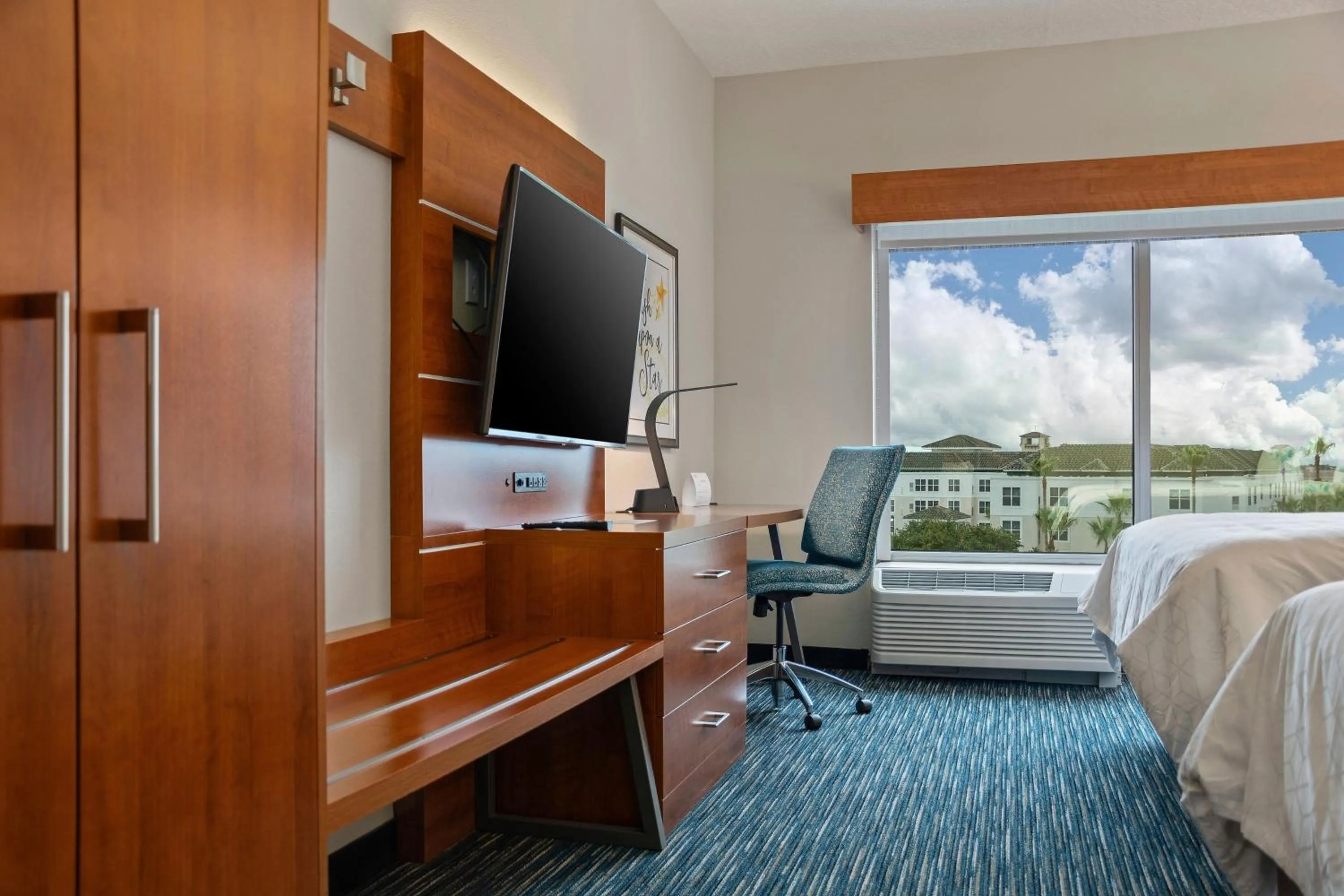 Photo of the whole room, Bed in Holiday Inn Express & Suites Orlando- Lake Buena Vista by IHG