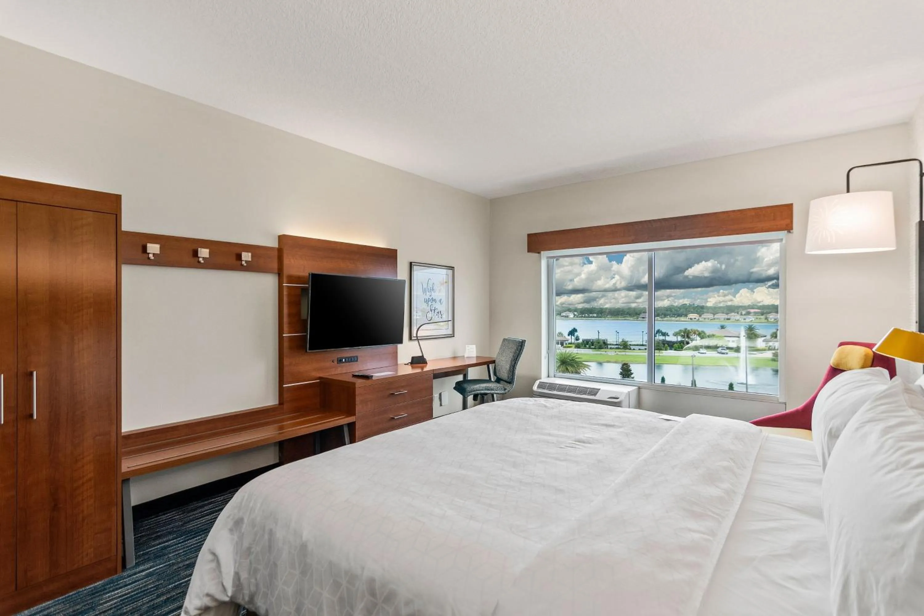 Photo of the whole room, Bed in Holiday Inn Express & Suites Orlando- Lake Buena Vista by IHG