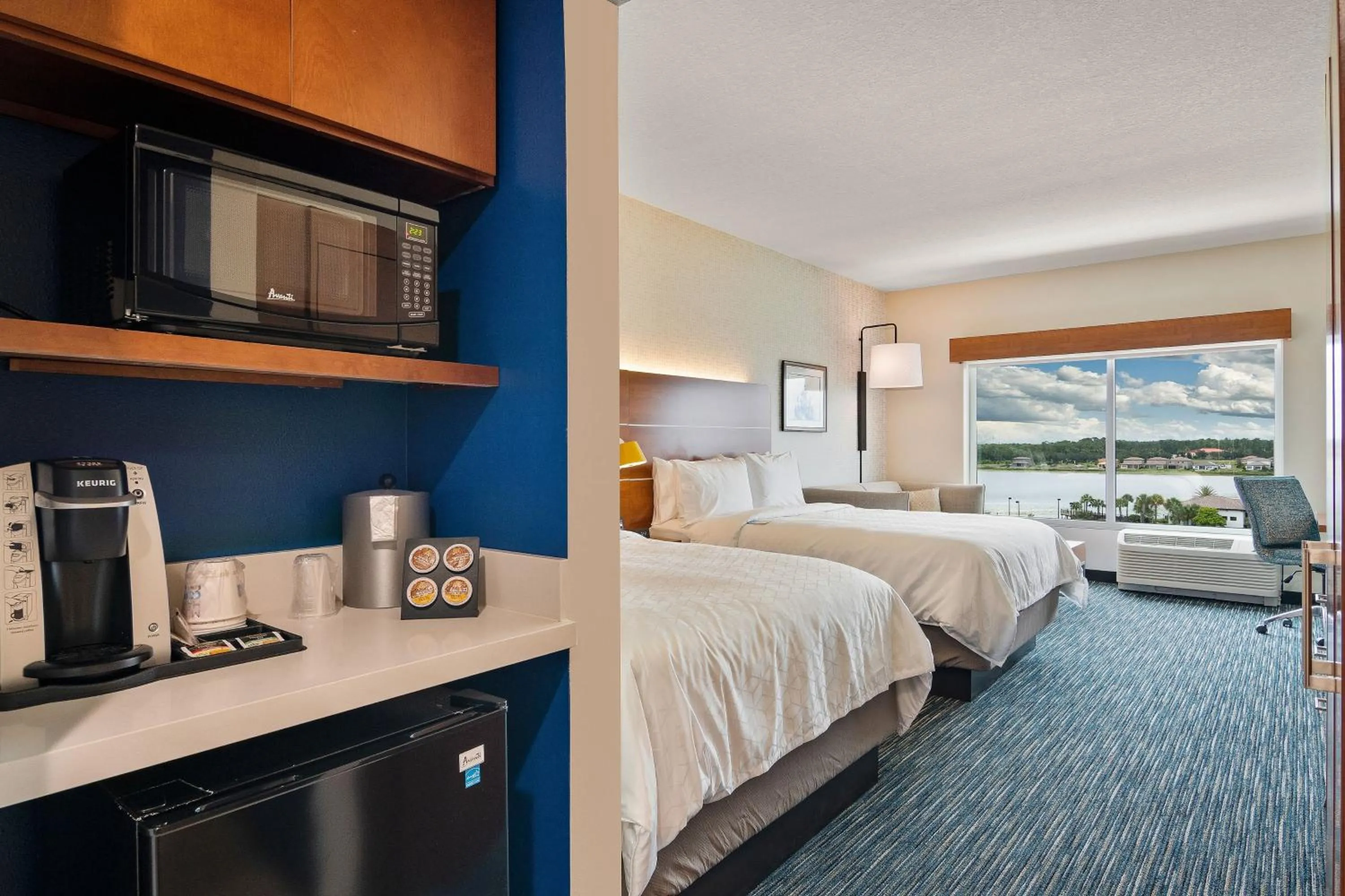 Photo of the whole room, Bed in Holiday Inn Express & Suites Orlando- Lake Buena Vista by IHG