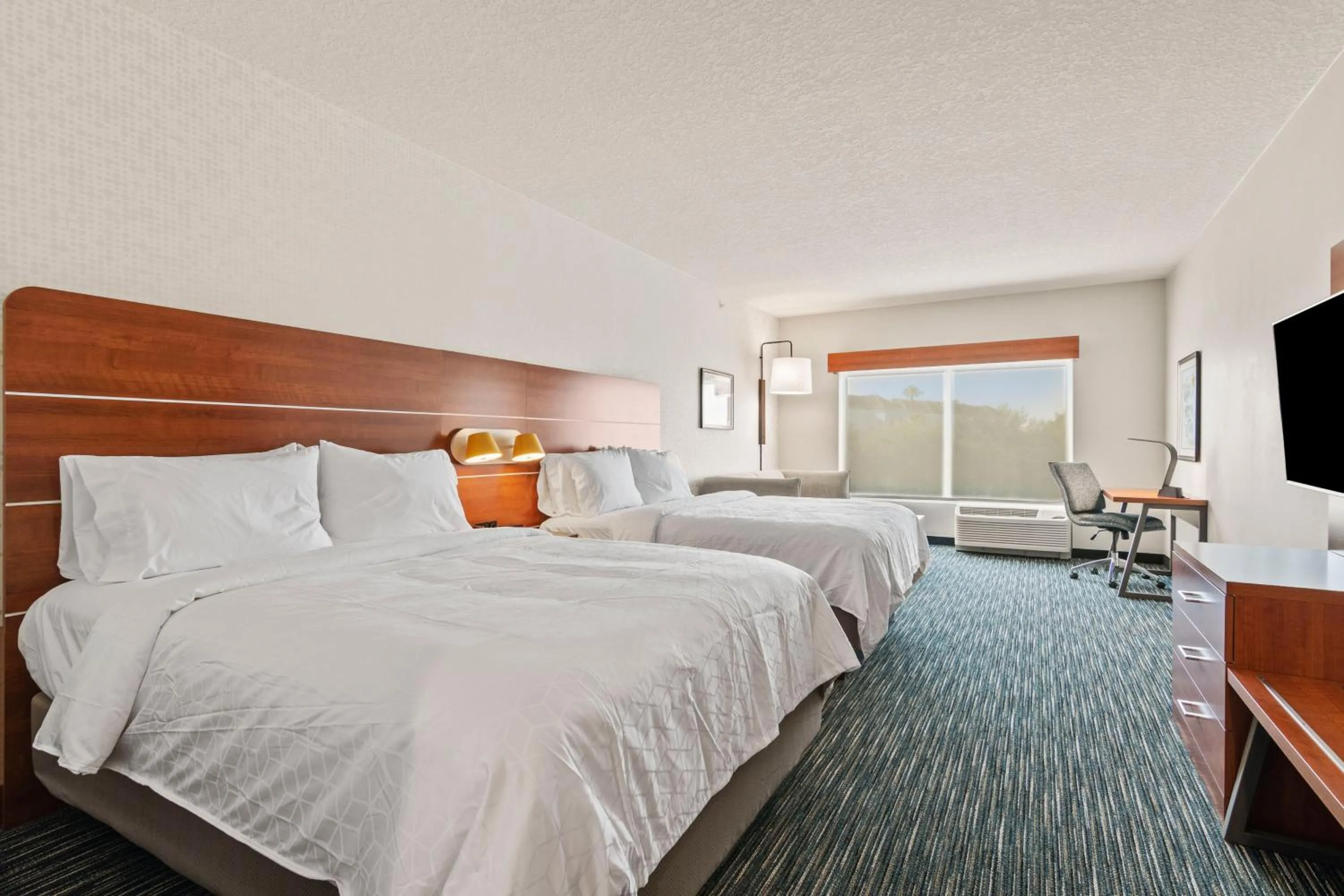 Photo of the whole room, Bed in Holiday Inn Express & Suites Orlando- Lake Buena Vista by IHG