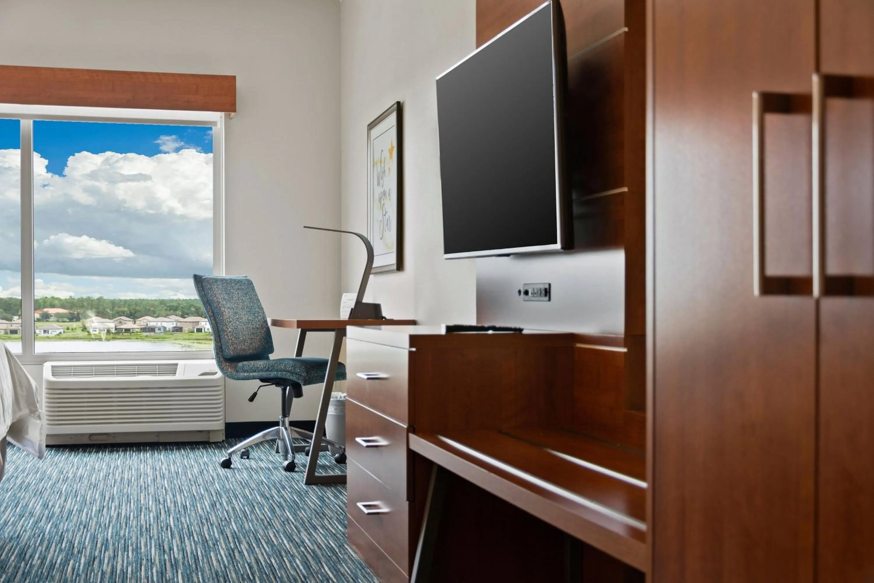Photo of the whole room in Holiday Inn Express & Suites Orlando- Lake Buena Vista by IHG