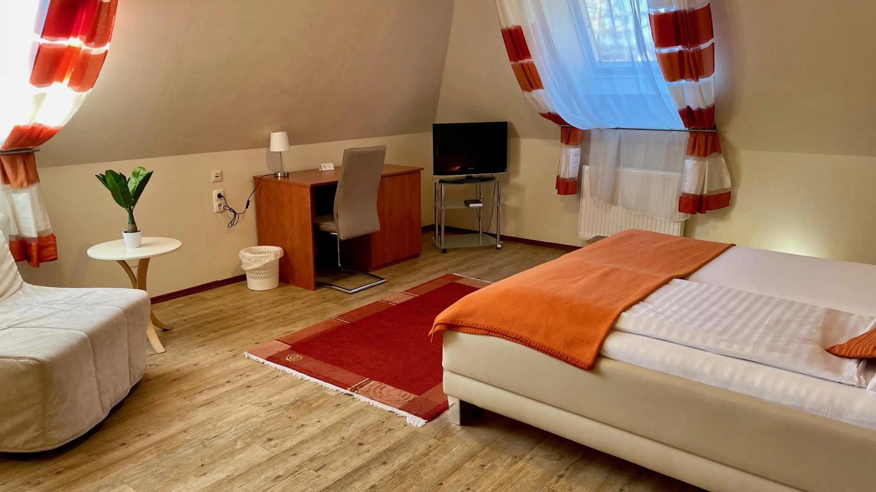 Photo of the whole room in Gösser BACHGASSLHOF -- Bed and Breakfast -- Apartments