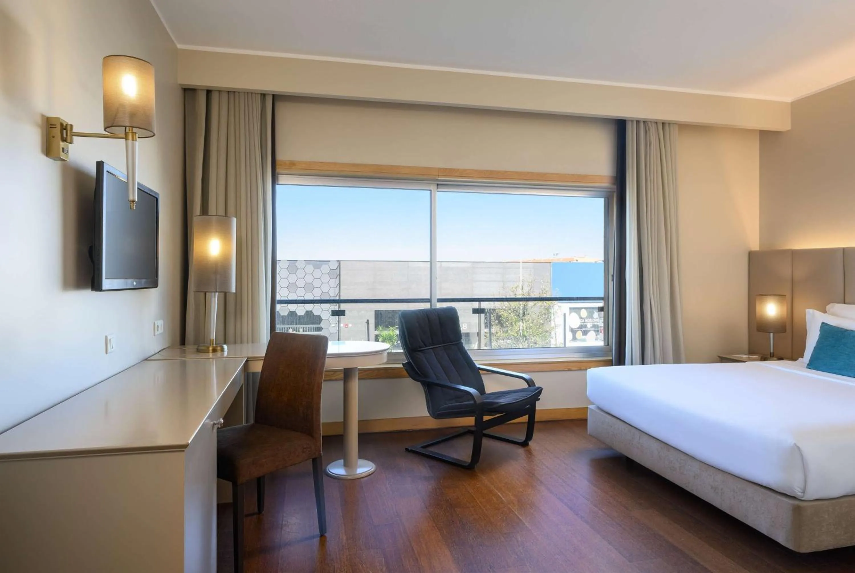 Photo of the whole room, Bed in TRYP by Wyndham Porto Expo Hotel