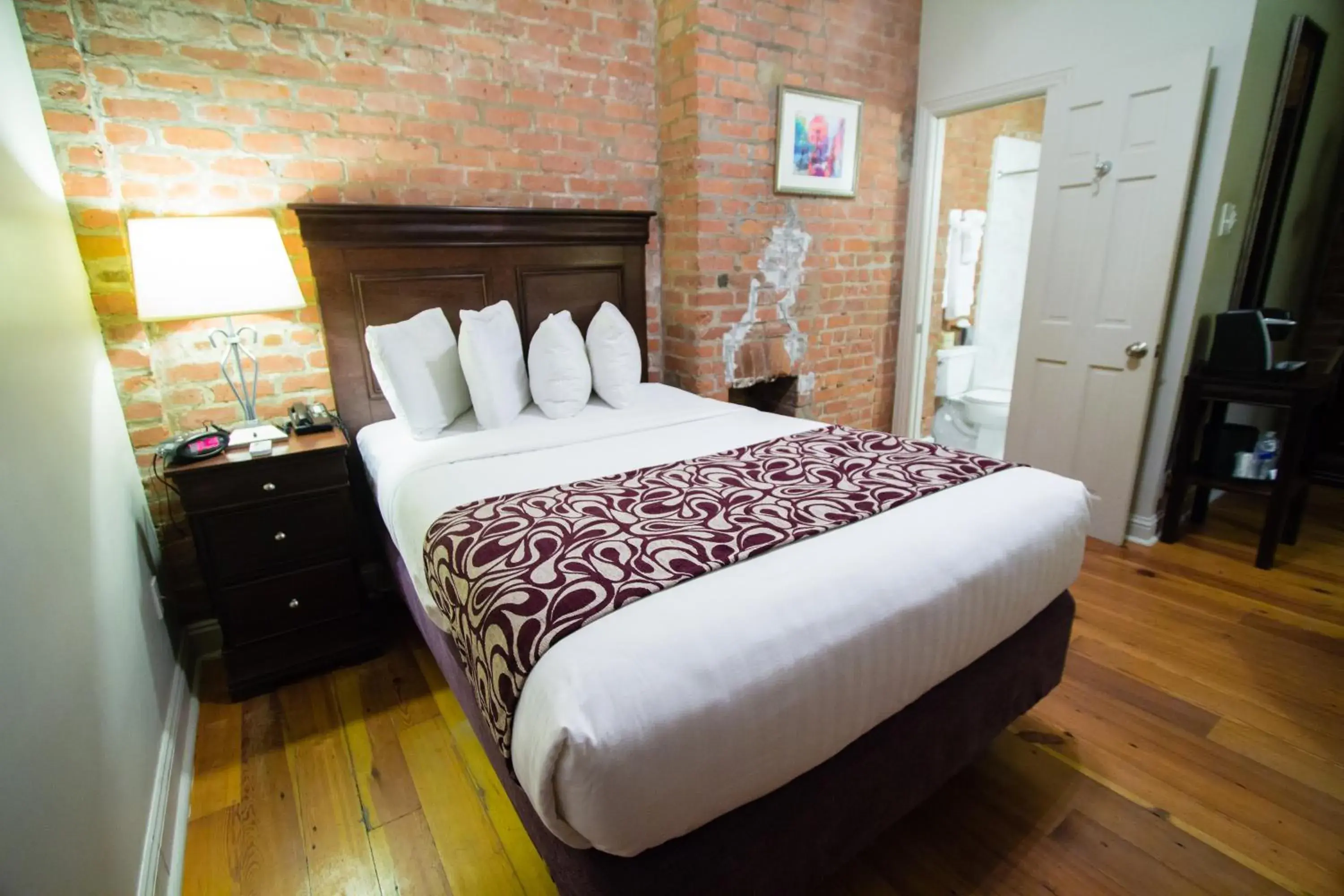 Bed in Inn on St. Ann, a French Quarter Guest Houses Property