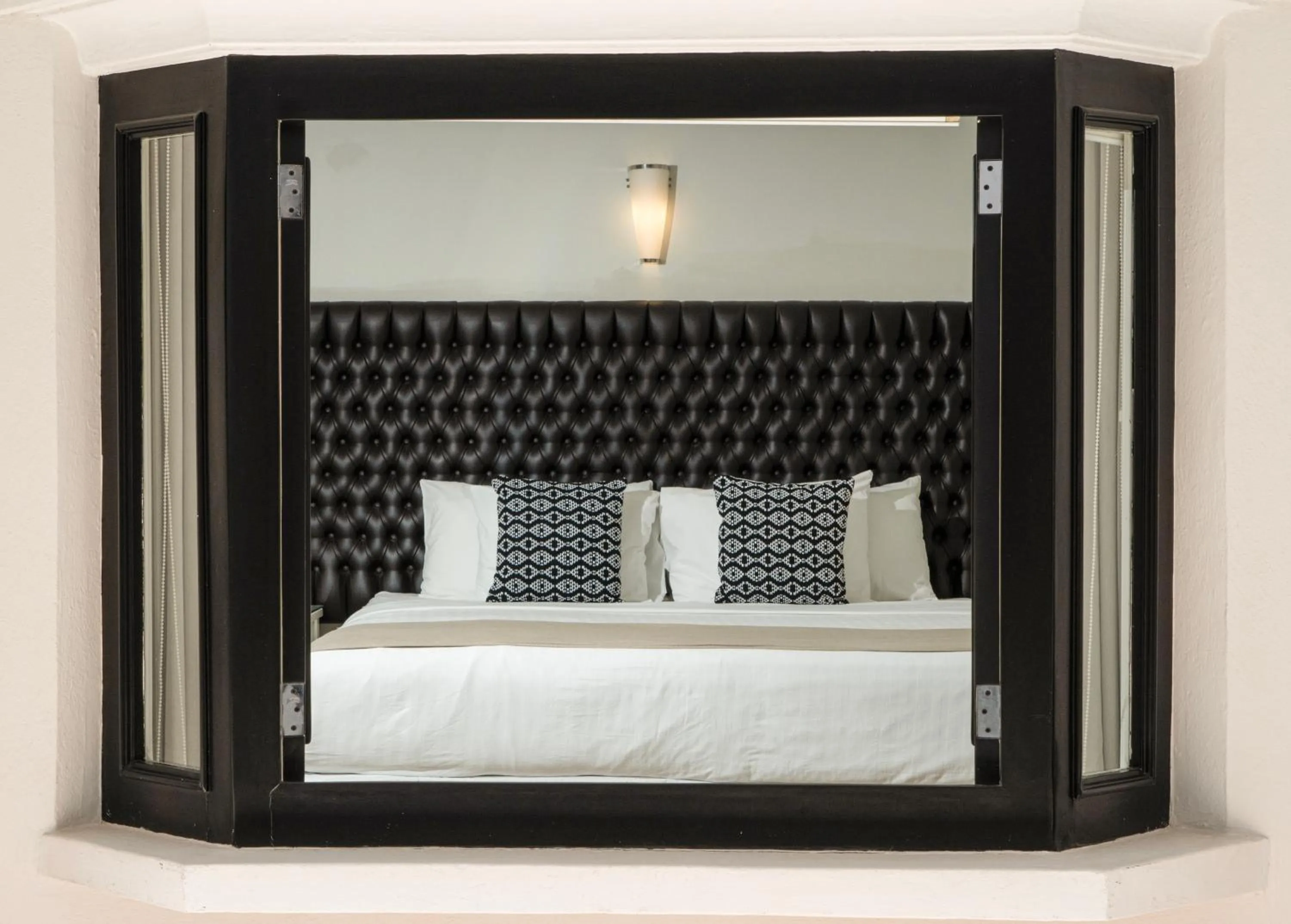 Bed in Casa Bonita Hotel & Luxury Residence