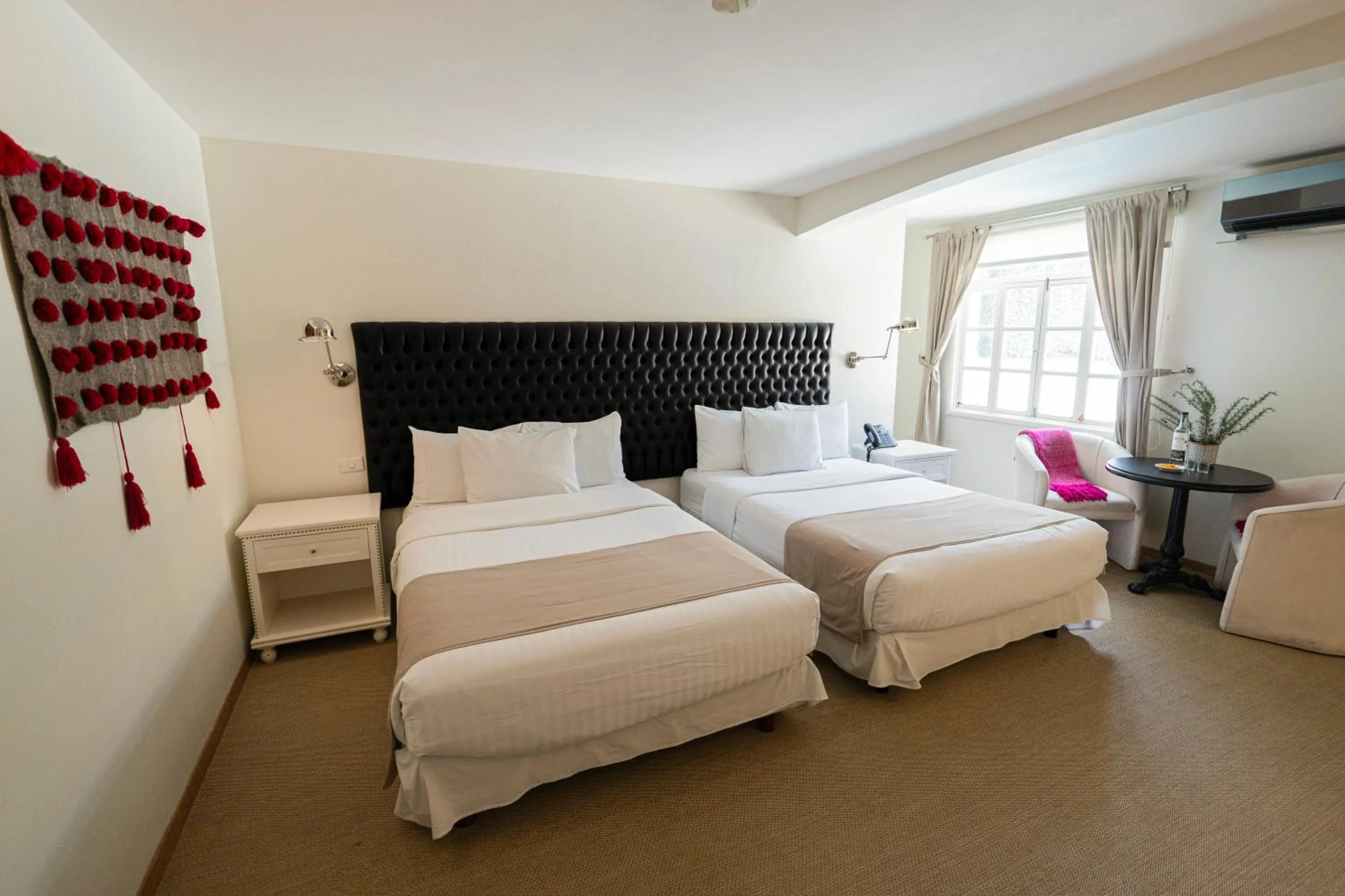 Bed in Casa Bonita Hotel & Luxury Residence