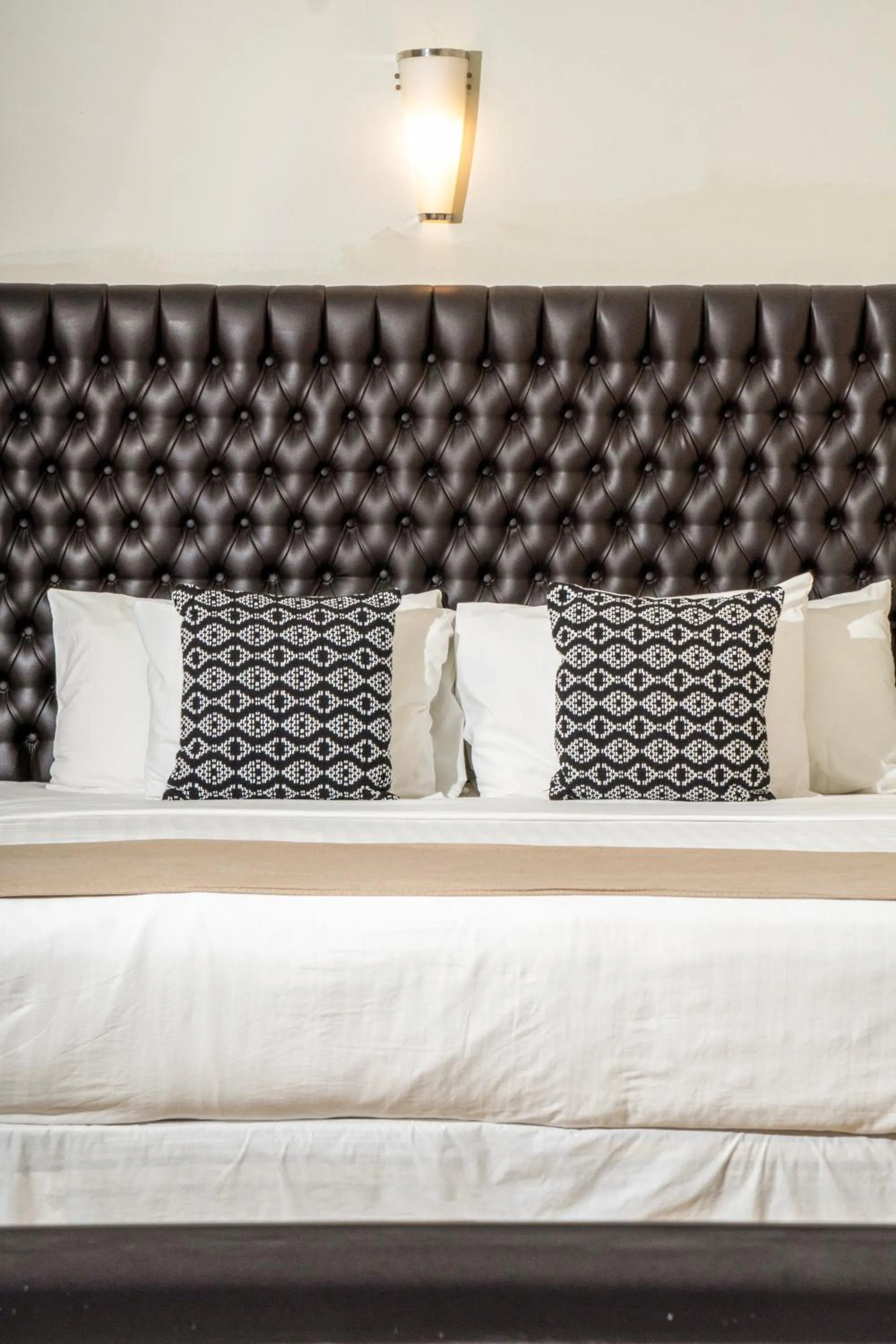 Bed in Casa Bonita Hotel & Luxury Residence