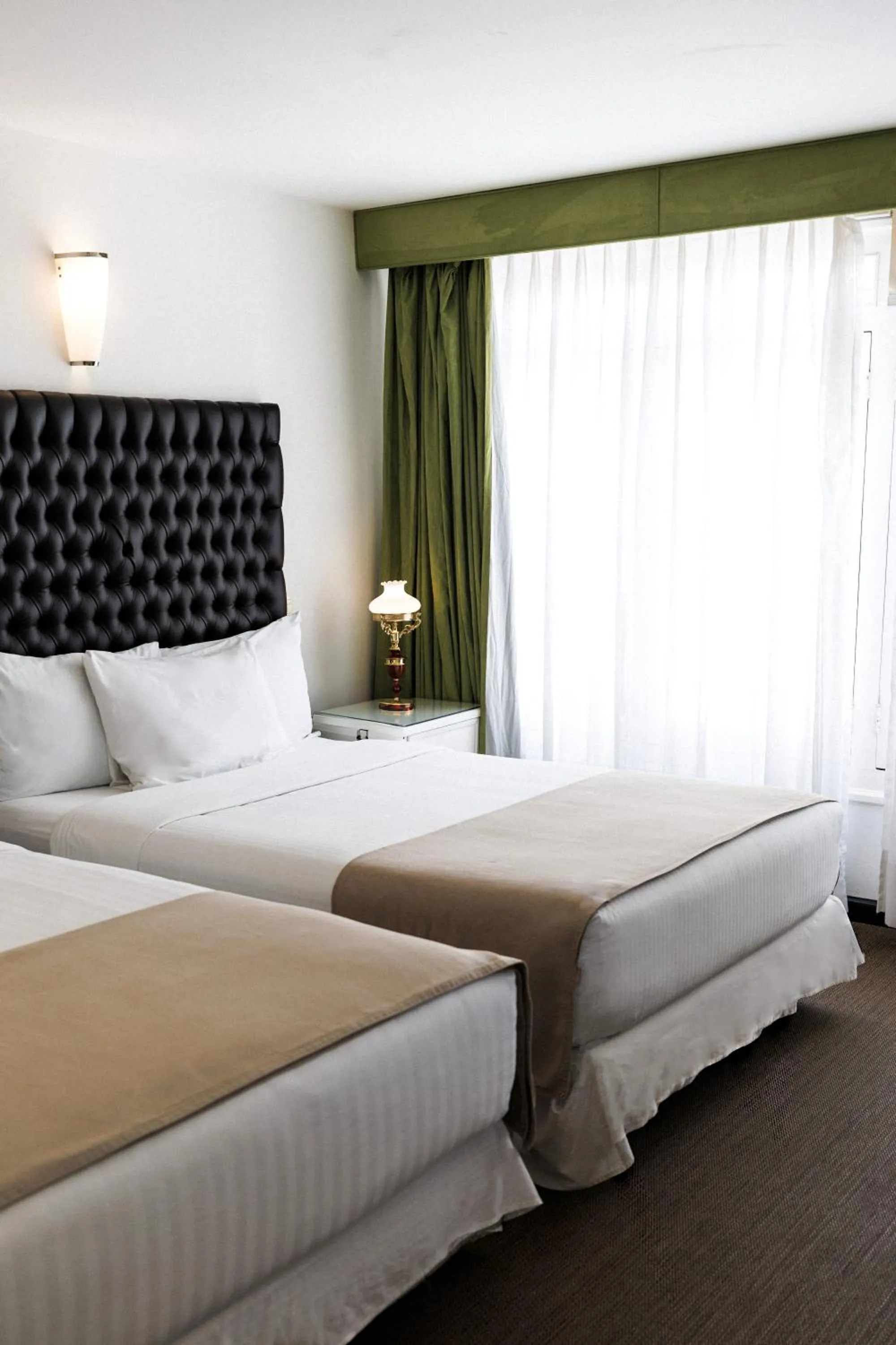Bed in Casa Bonita Hotel & Luxury Residence