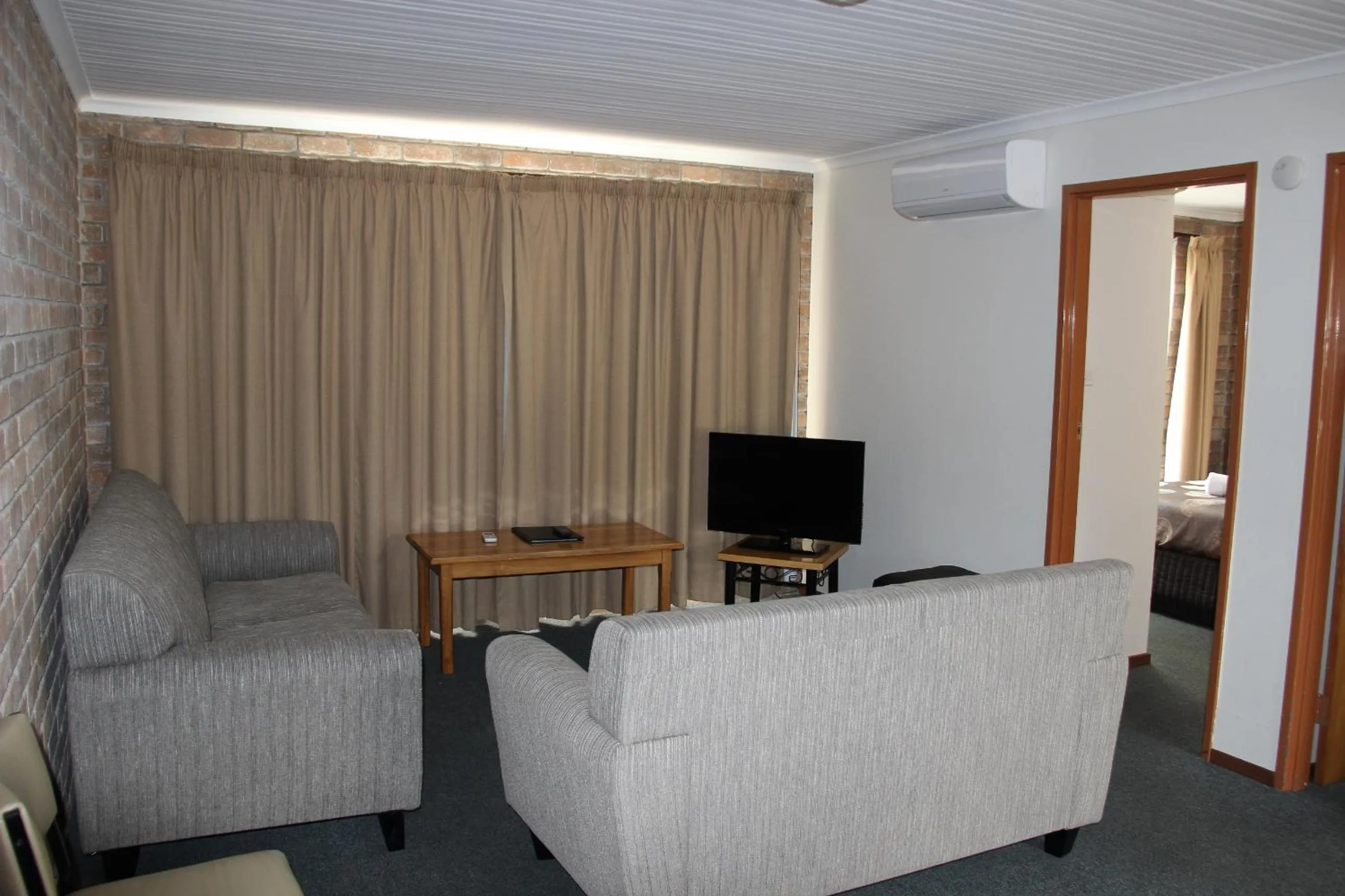 Living room in Burnie Ocean View Motel and Caravan Park