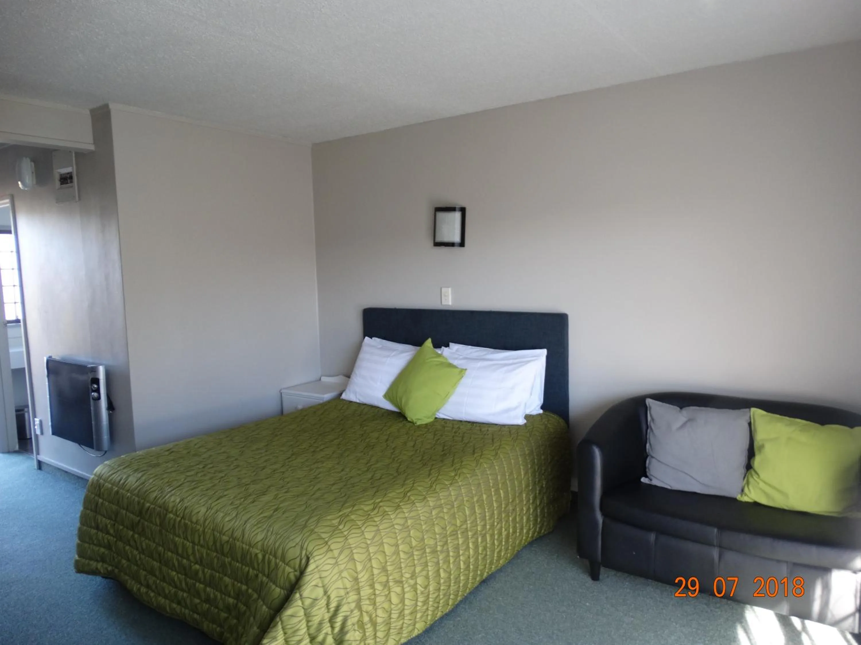 Bed in Ambassador Motel