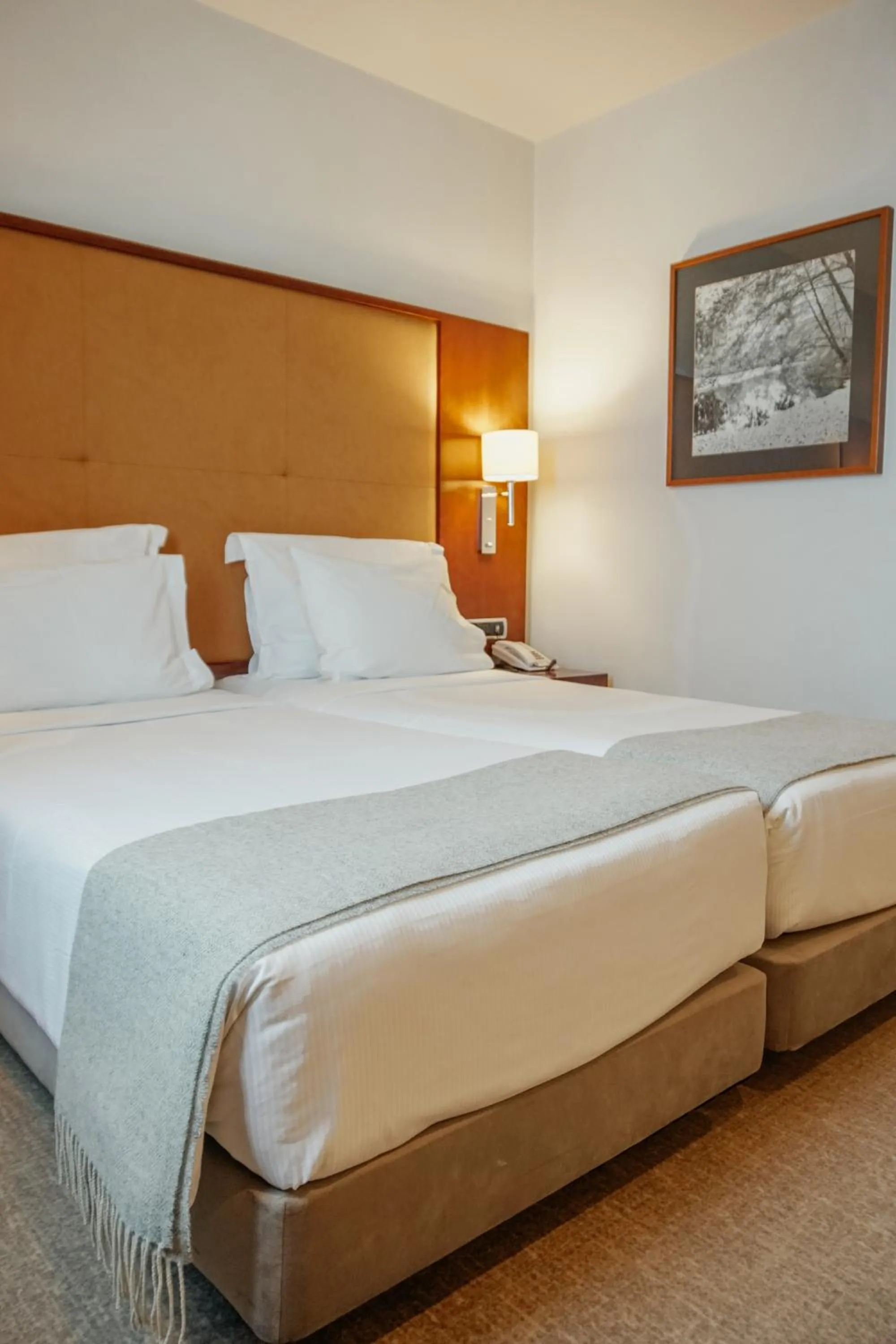 Bed in Hotel Dom Carlos Liberty