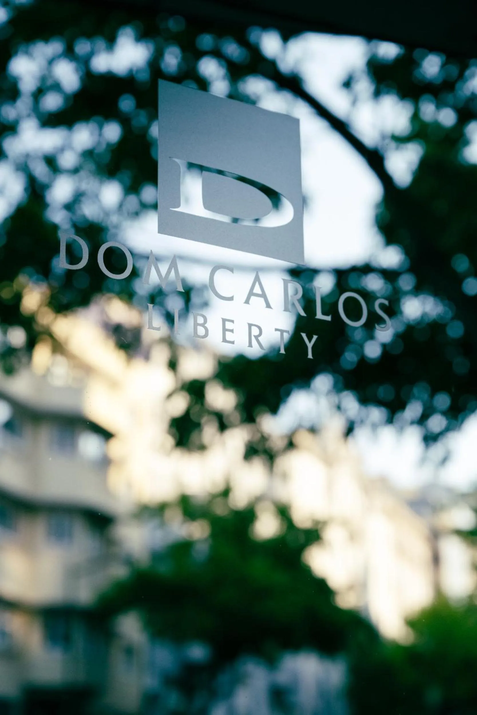 Property logo or sign in Hotel Dom Carlos Liberty