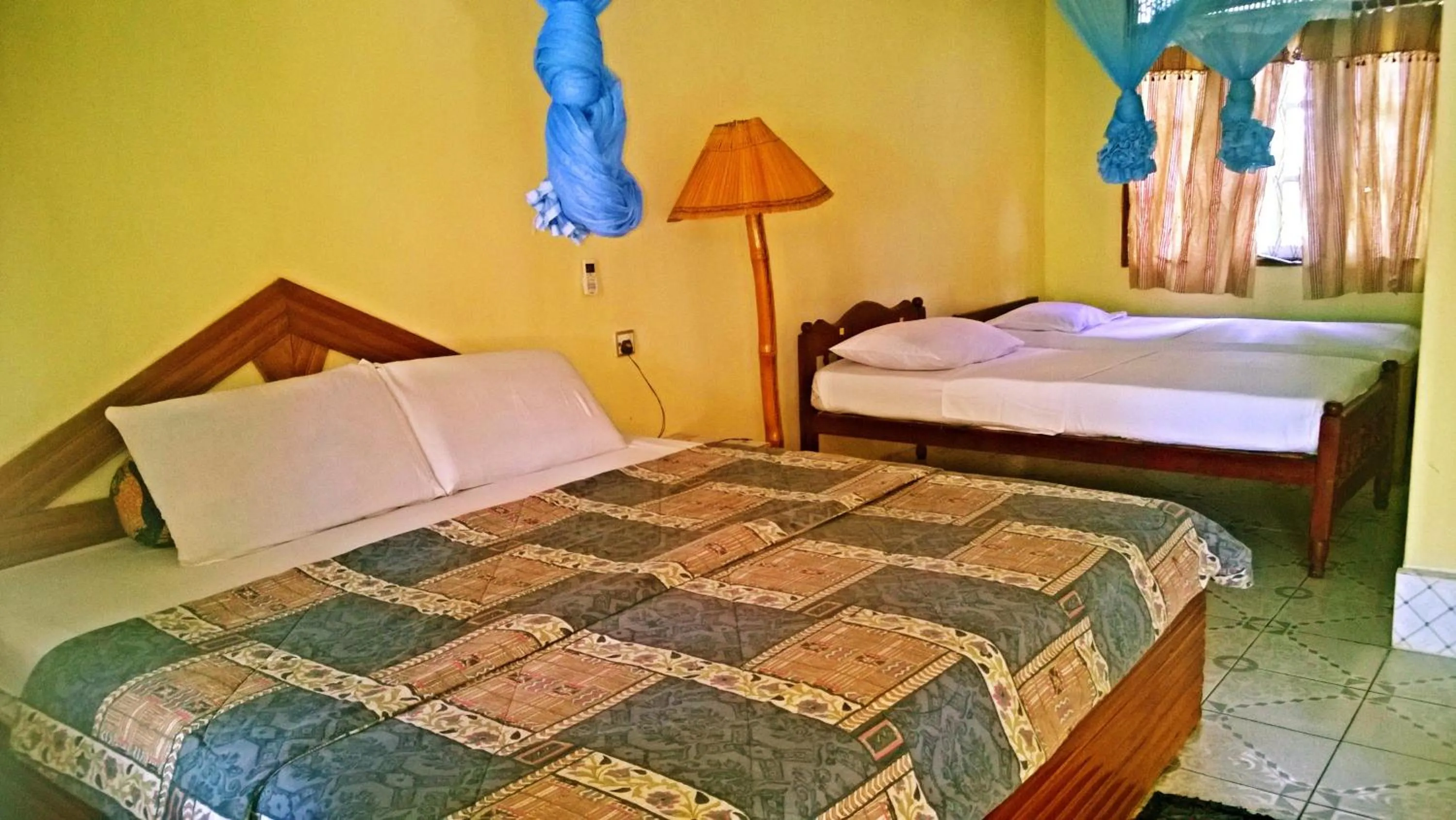Bed in Sigiri Holiday Inn