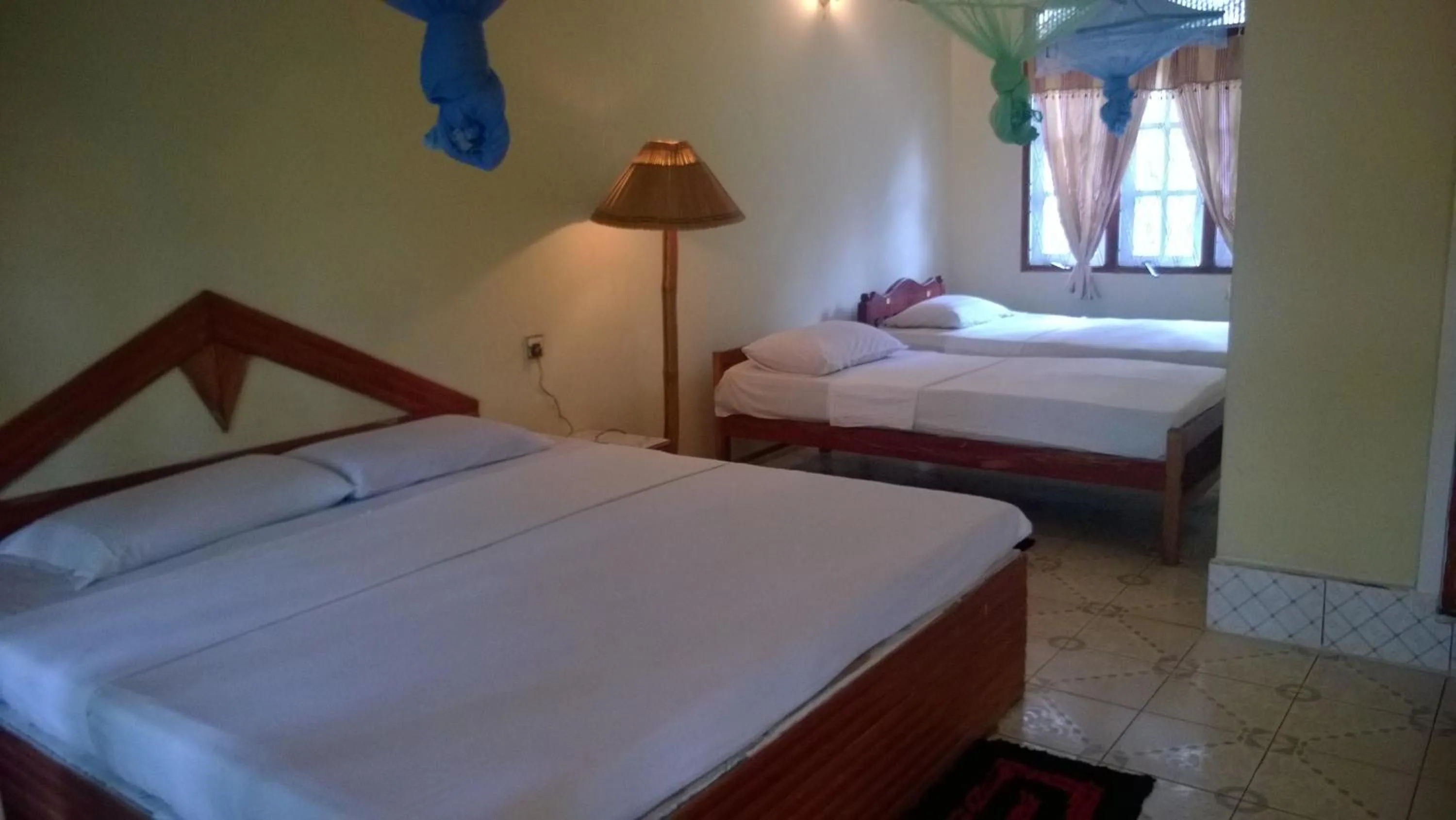 Bed in Sigiri Holiday Inn
